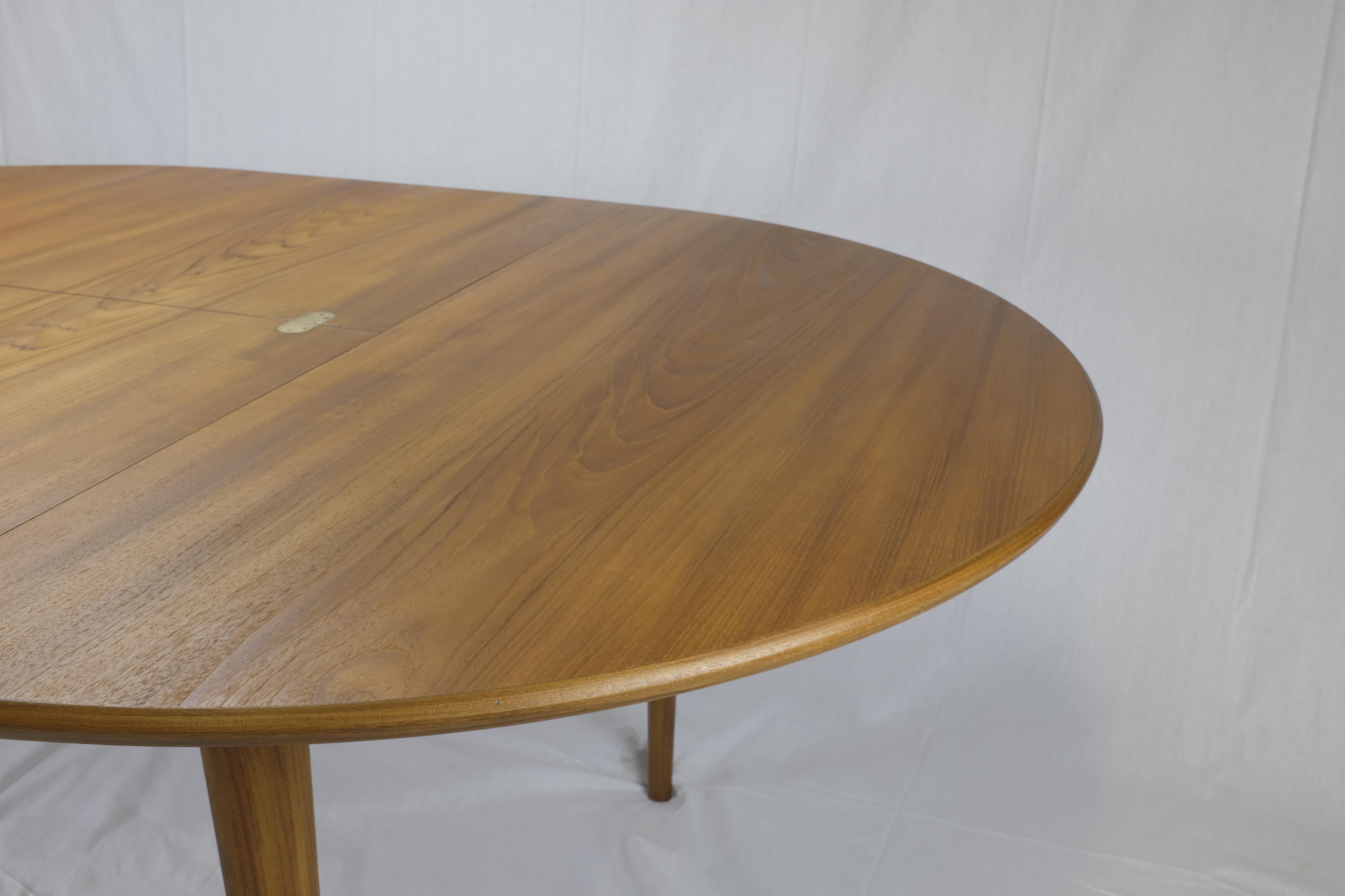 Danish Modern Teak Round Dining Table with Butterfly Leaf 1
