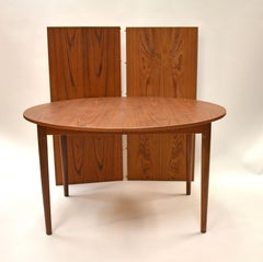 Danish Modern Teak Round Dining Table with Two Leaves