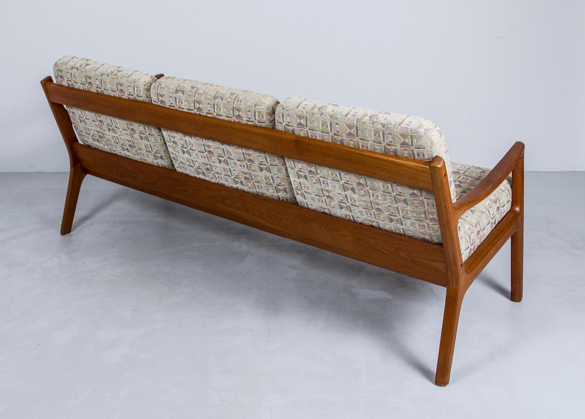 This gorgeous and sturdily constructed teak frame sofa was designed by Ole Wanscher for France & Son in the 1960s as part of the 