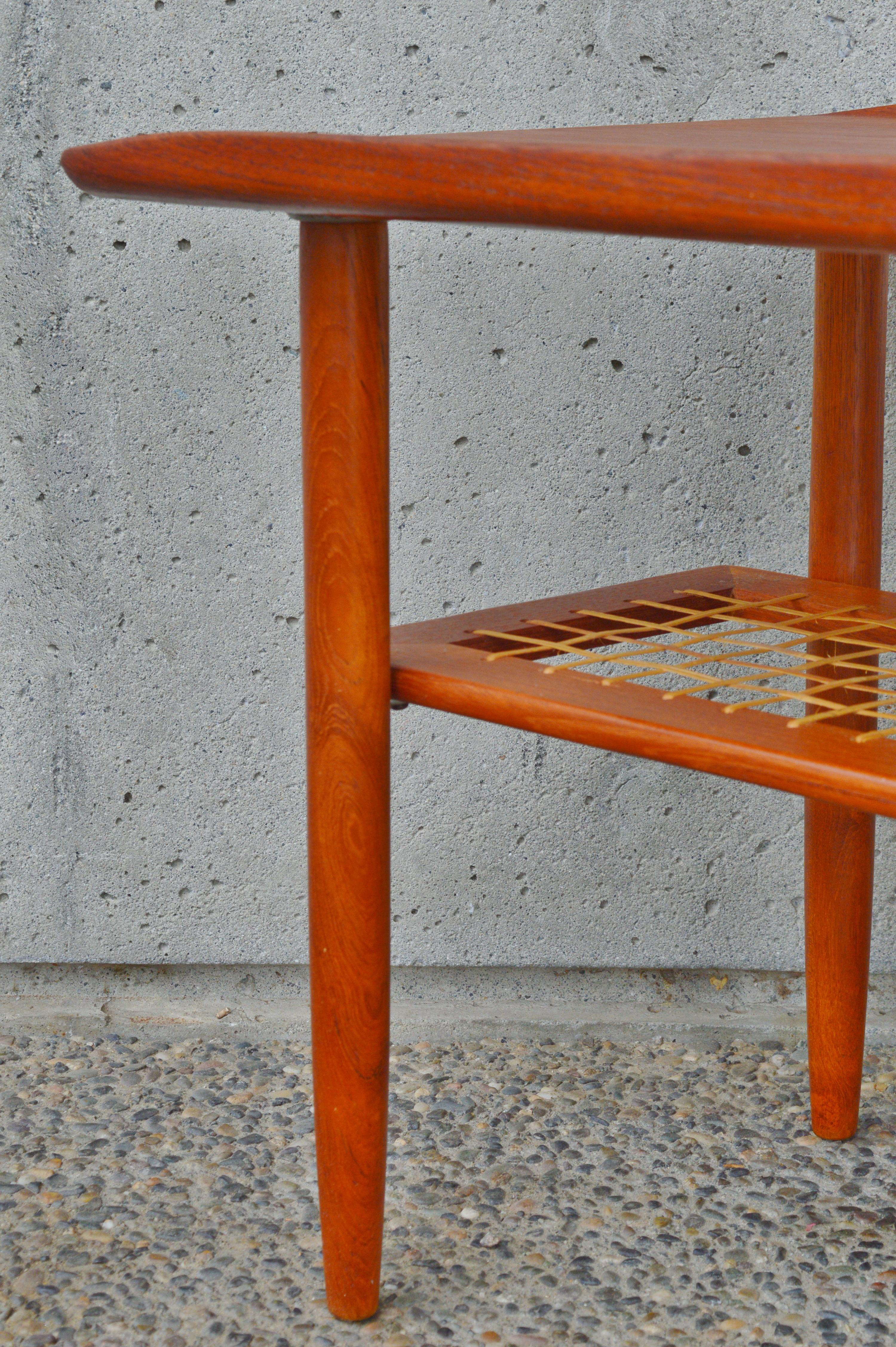 Mid-20th Century Danish Modern Teak Side Table Flared Edges, Lower Cane Shelf