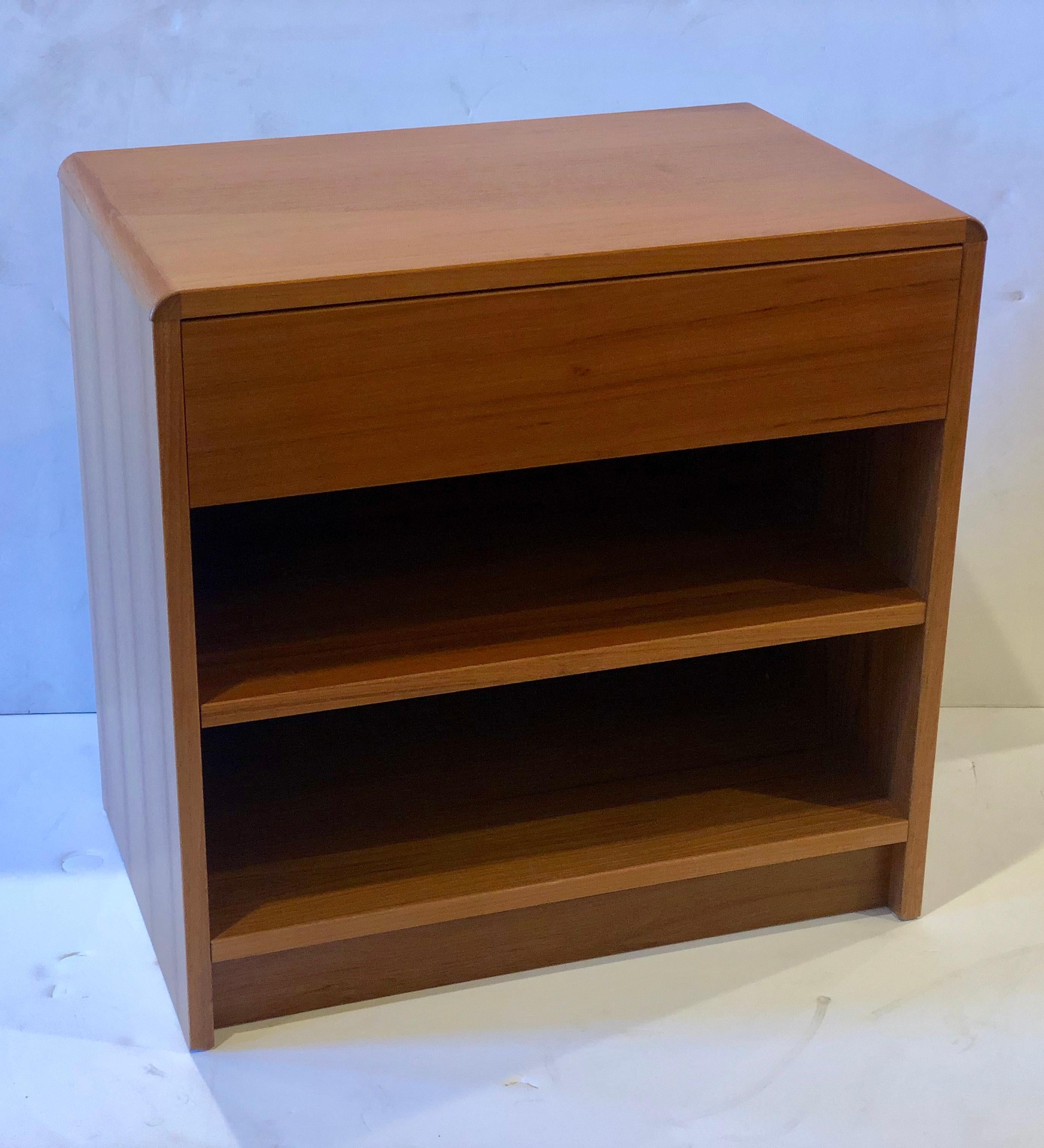 Danish modern teak singe nightstand with shelf and drawer, circa 1980s in great condition with shelf and drawer perfect for the extra room very clean piece with original finish, simple design.