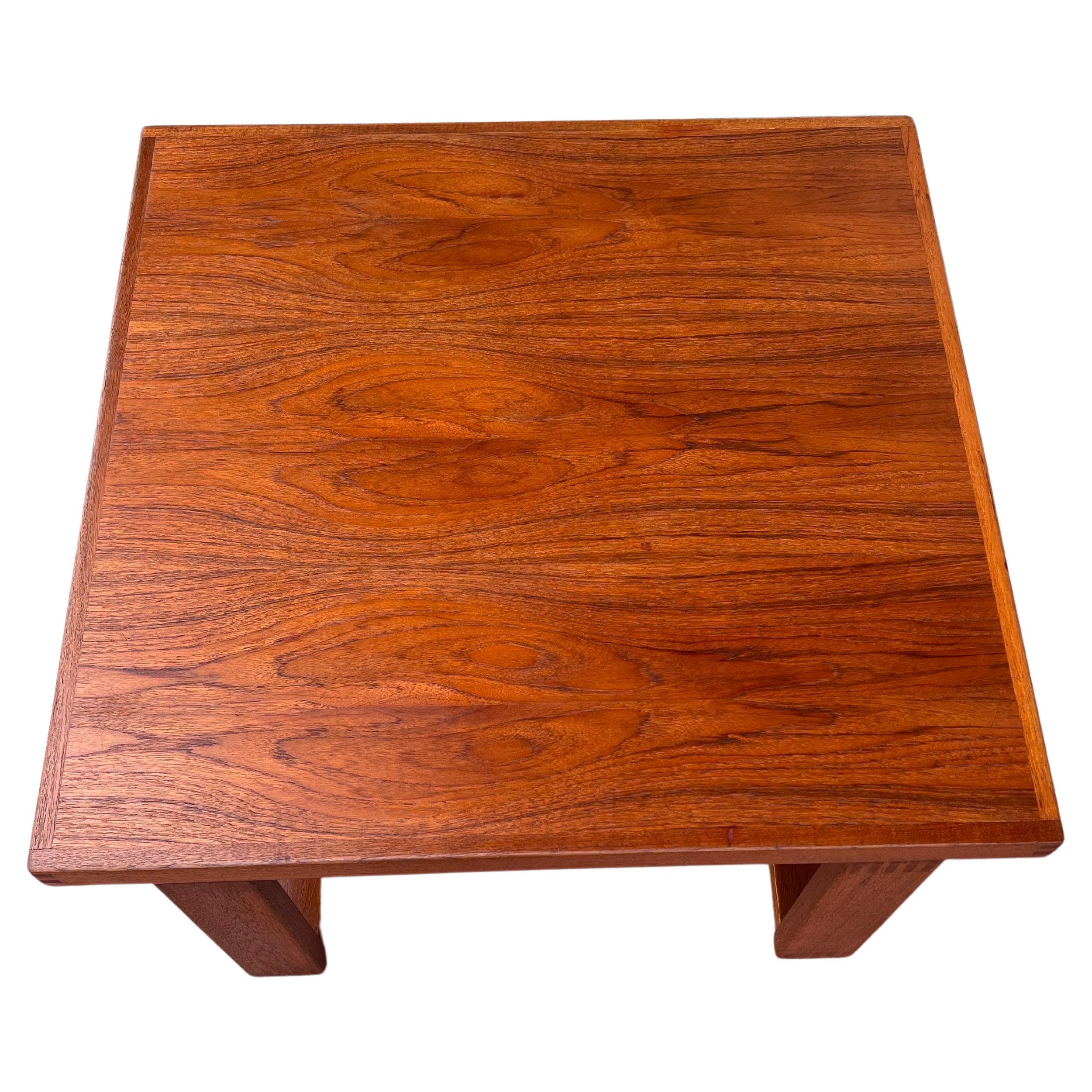beautiful simple large square coffee table, in teak by Trioh, circa 1980s freshly refinished solid with nice dove tail corners and legs, great craftsmanship.