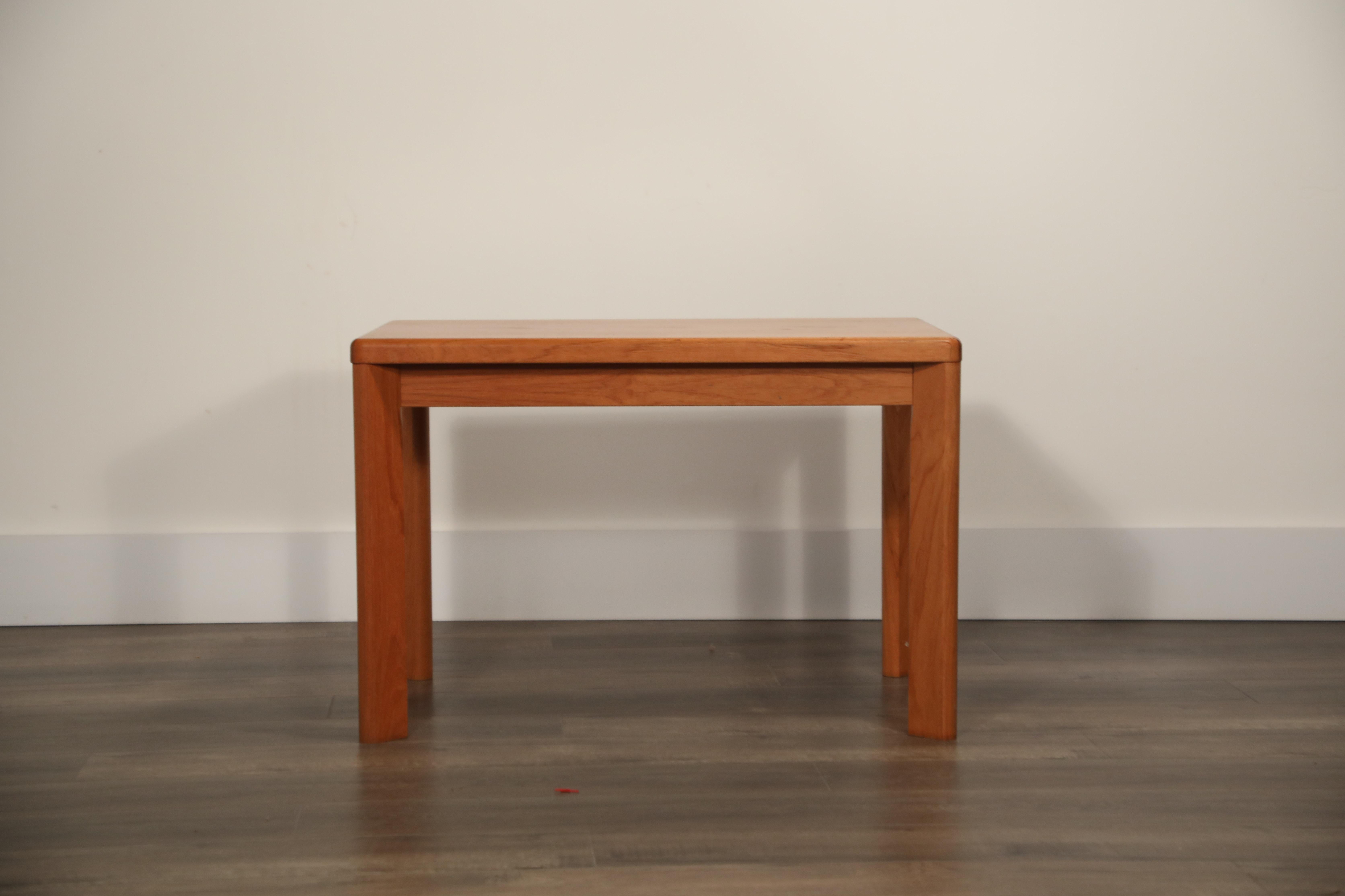 A cute Danish modern teak side table / end table (or coffee table for a smaller room) designed by Henning Kjaernulf for Vejle Stole & Møbelfabrik, from the 1960s, and is signed underneath. 

This stylish Mid-Century Modern occasional table can be