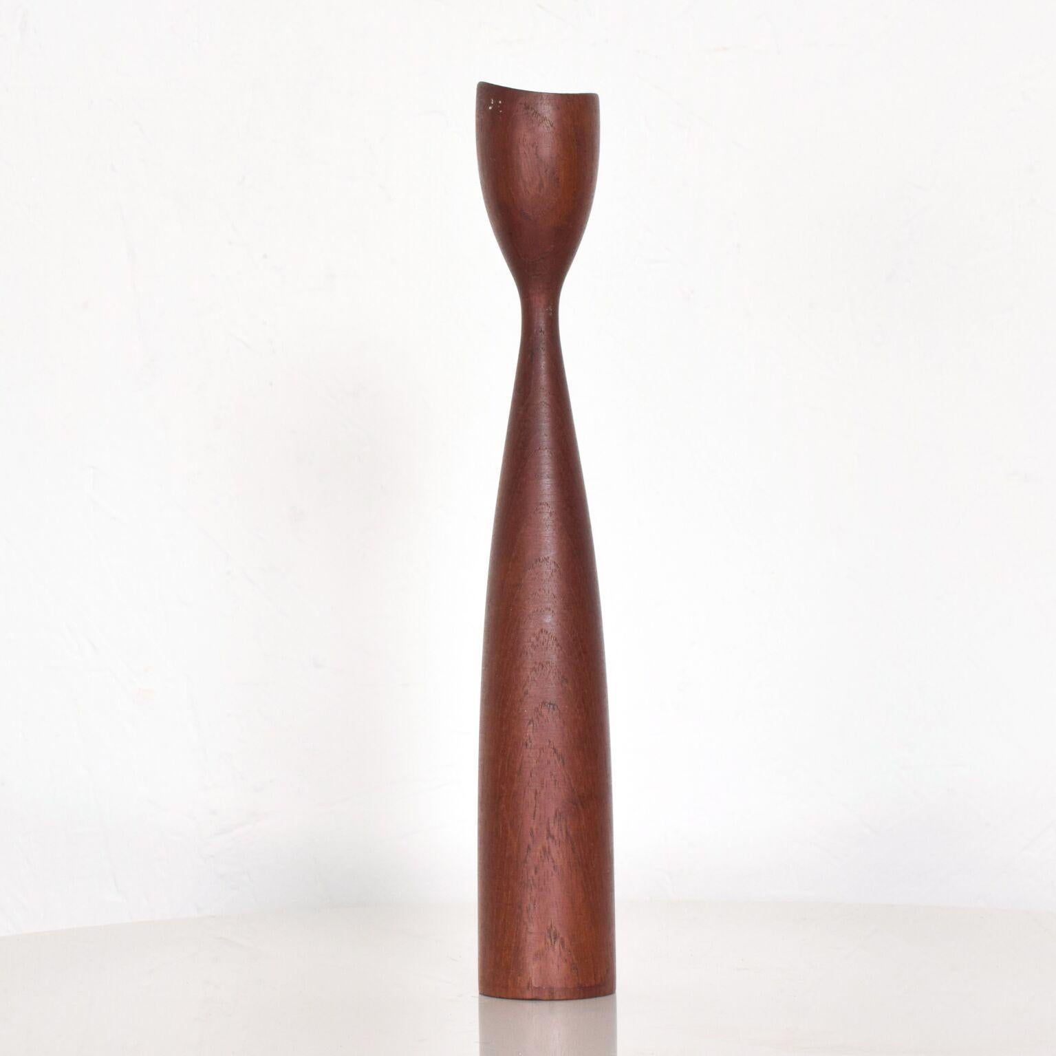 For your consideration: Danish modern teak wood taper candleholder in sculptural Tulip form. Dimensions: 11 5/8