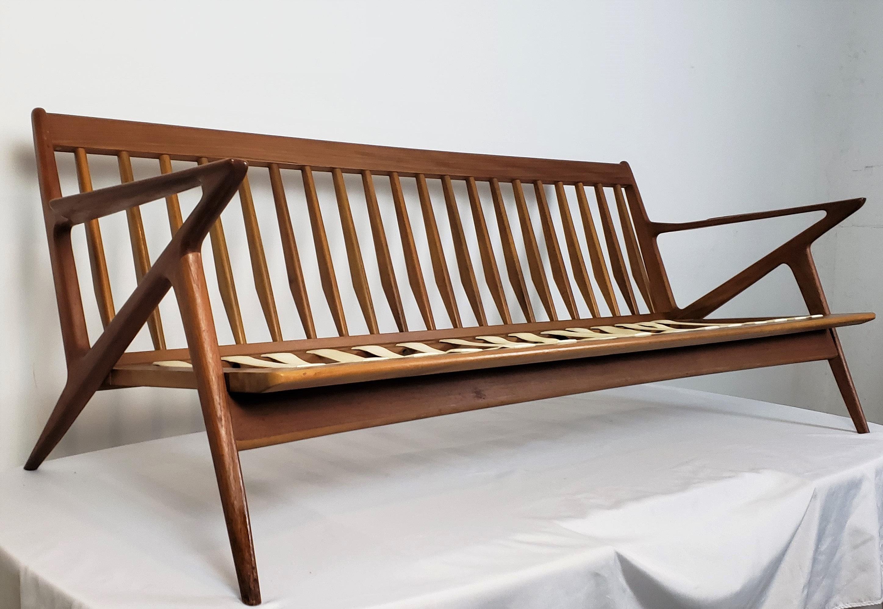 Midcentury Z three-seat sofa by Poul Jensen for Selig. This piece had been well preserved over the years, shows very little wear and retains its original finish. The teak is in excellent condition and the sofa is tight and sturdy. The original