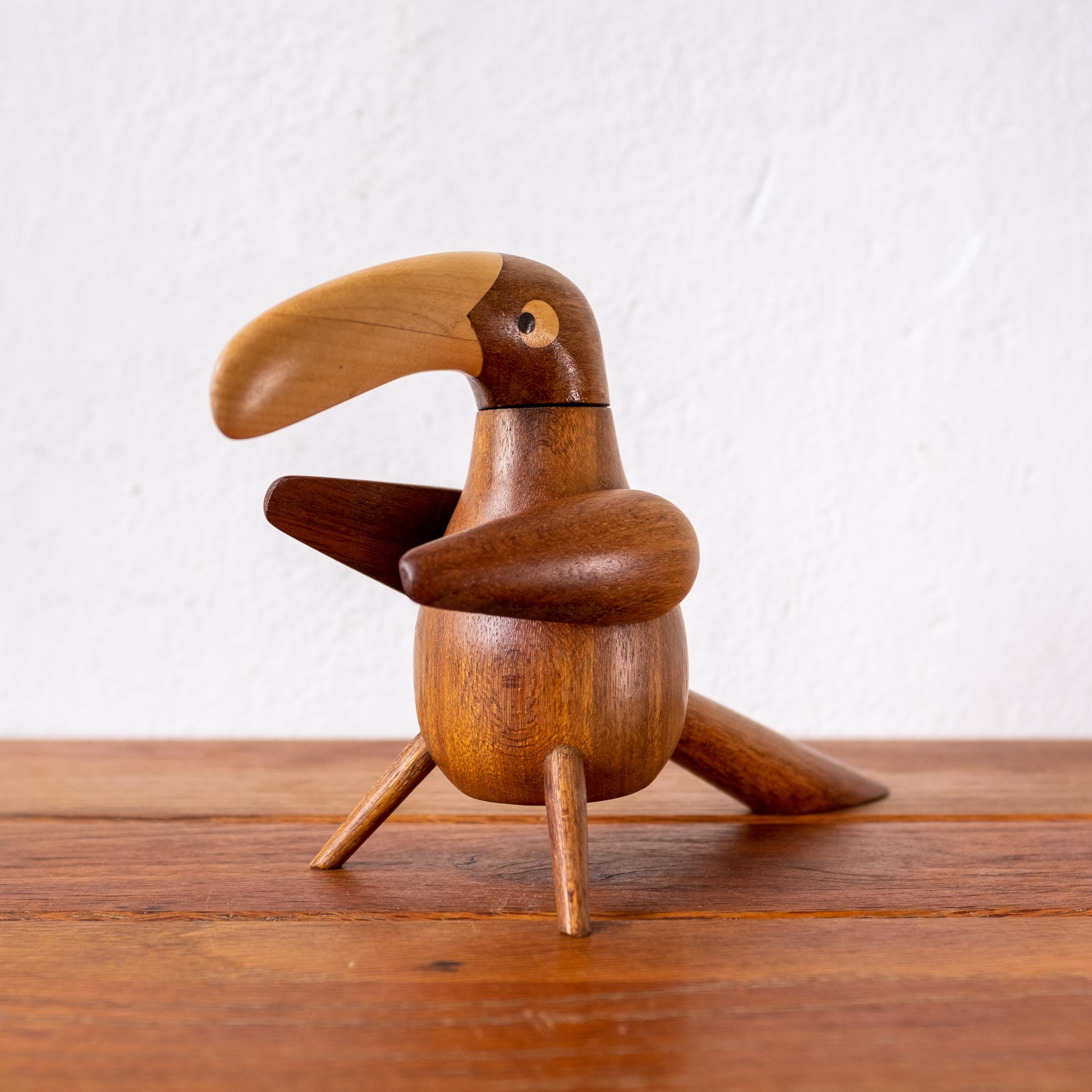 Toucan Pepper Mill by Sven Erik Tonn-Petersen (1925- 2004). The arm is removed to fill with pepper corns or other spices. Mixed wood with teak and birch. Made in Denmark.