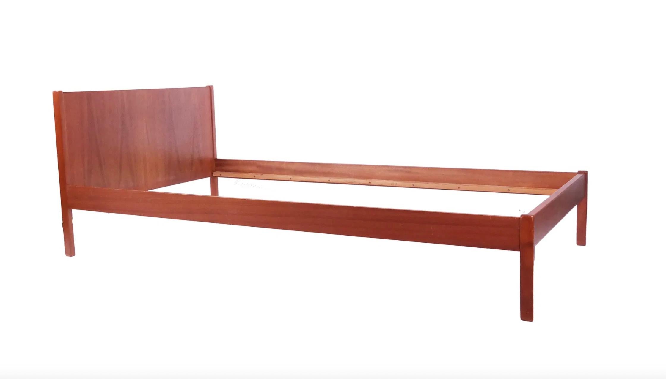 Danish Modern teak twin size bed frame with headboard and footboard. Mid-Century Modern teak single Bed. Fits a twin size mattress that has a boxspring. Made in Denmark circa 1960 Beautiful teak grain. 

Local Pick up in Brooklyn NYC or Kingston