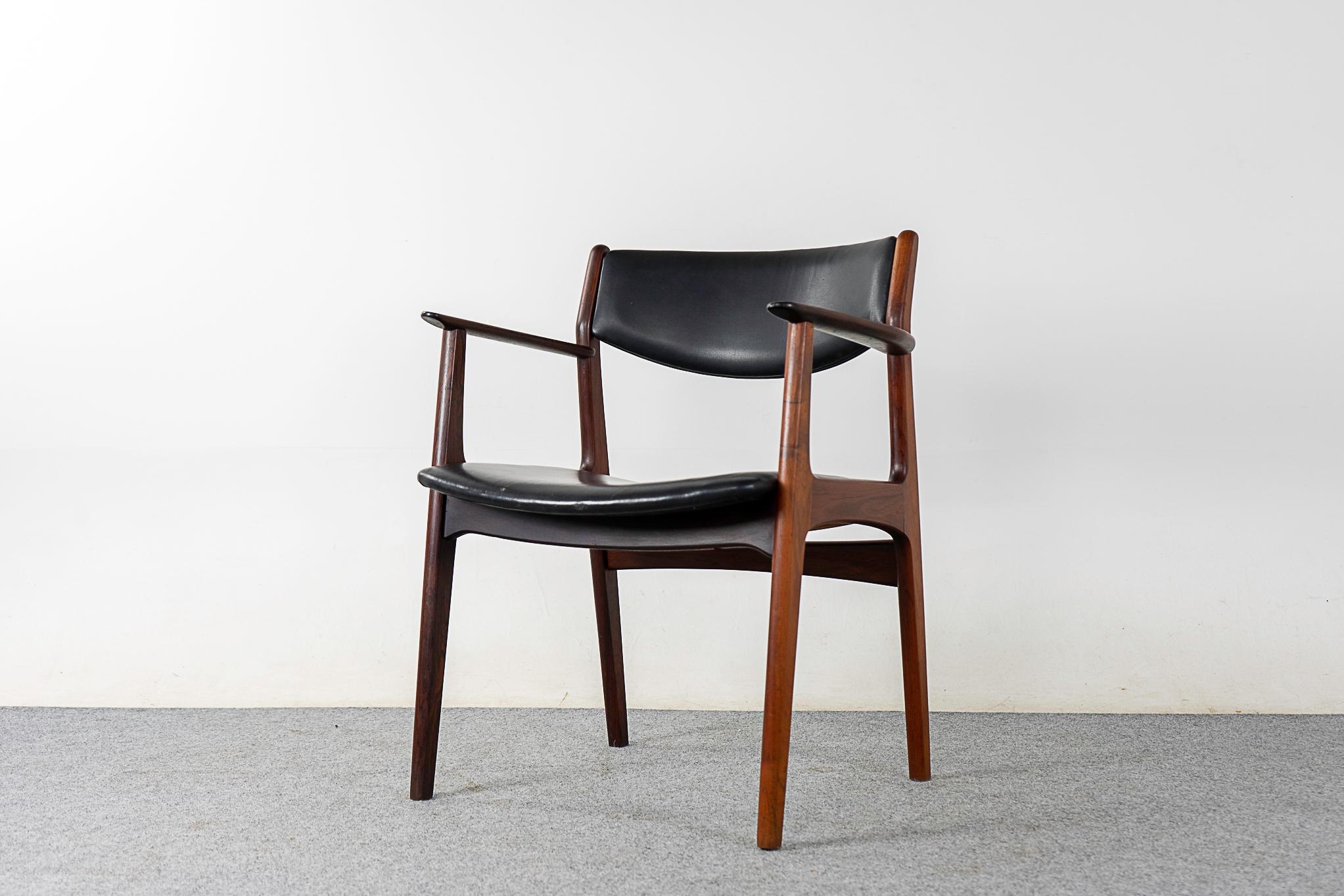 Teak and vinyl mid-century armchair, circa 1960's. Sturdy solid wood frame with lovely lines. Original upholstery in nice condition. Comfortable and stylish! 

Please inquire for remote and international shipping rates.