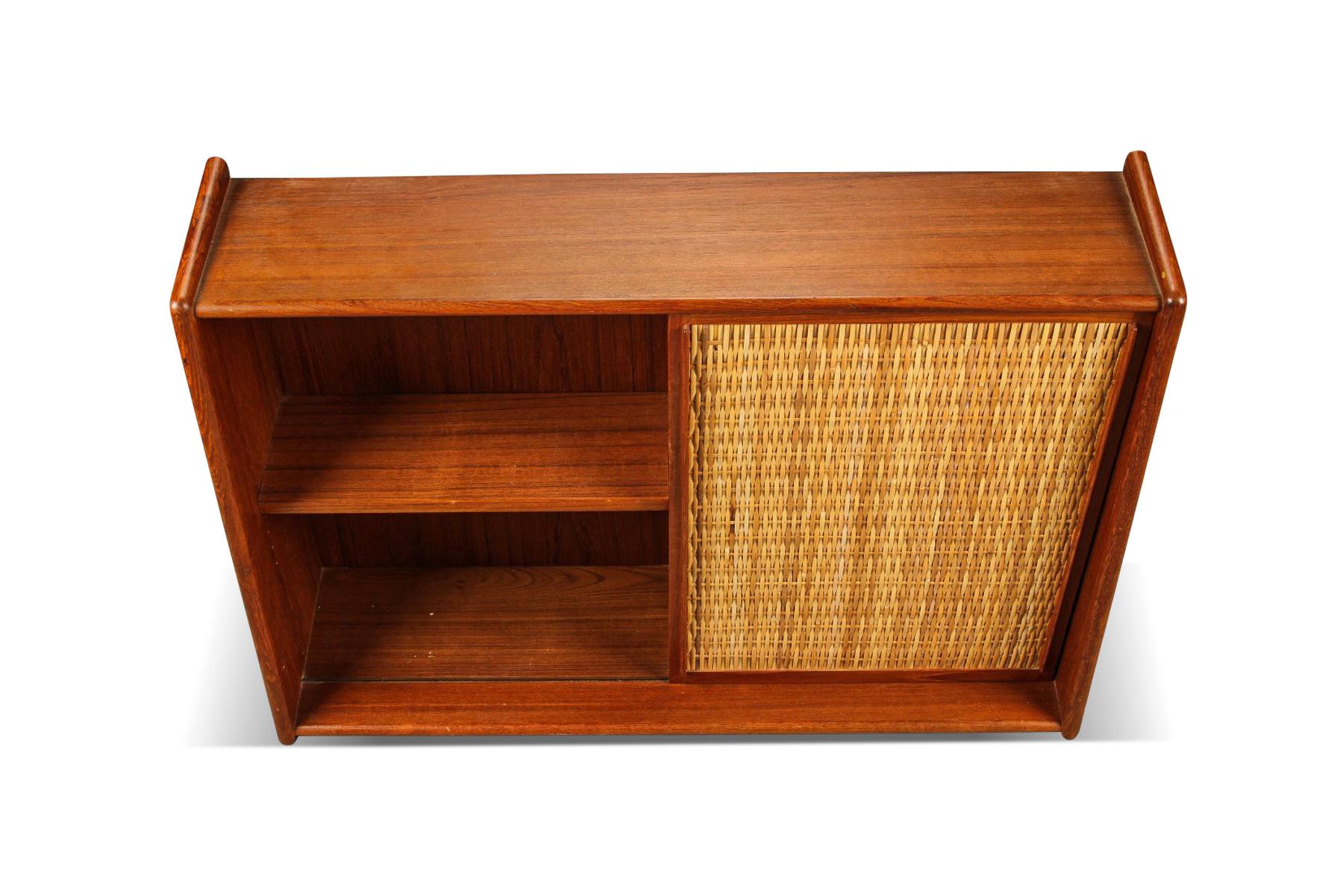 Origin: Denmark
Designer: Unknown
Manufacturer: Unknown
Era: 1950s
Materials: Teak, cane
Measurements: 35.5? wide x 9.5? deep x 25.75? tall

Condition:
In excellent original condition.