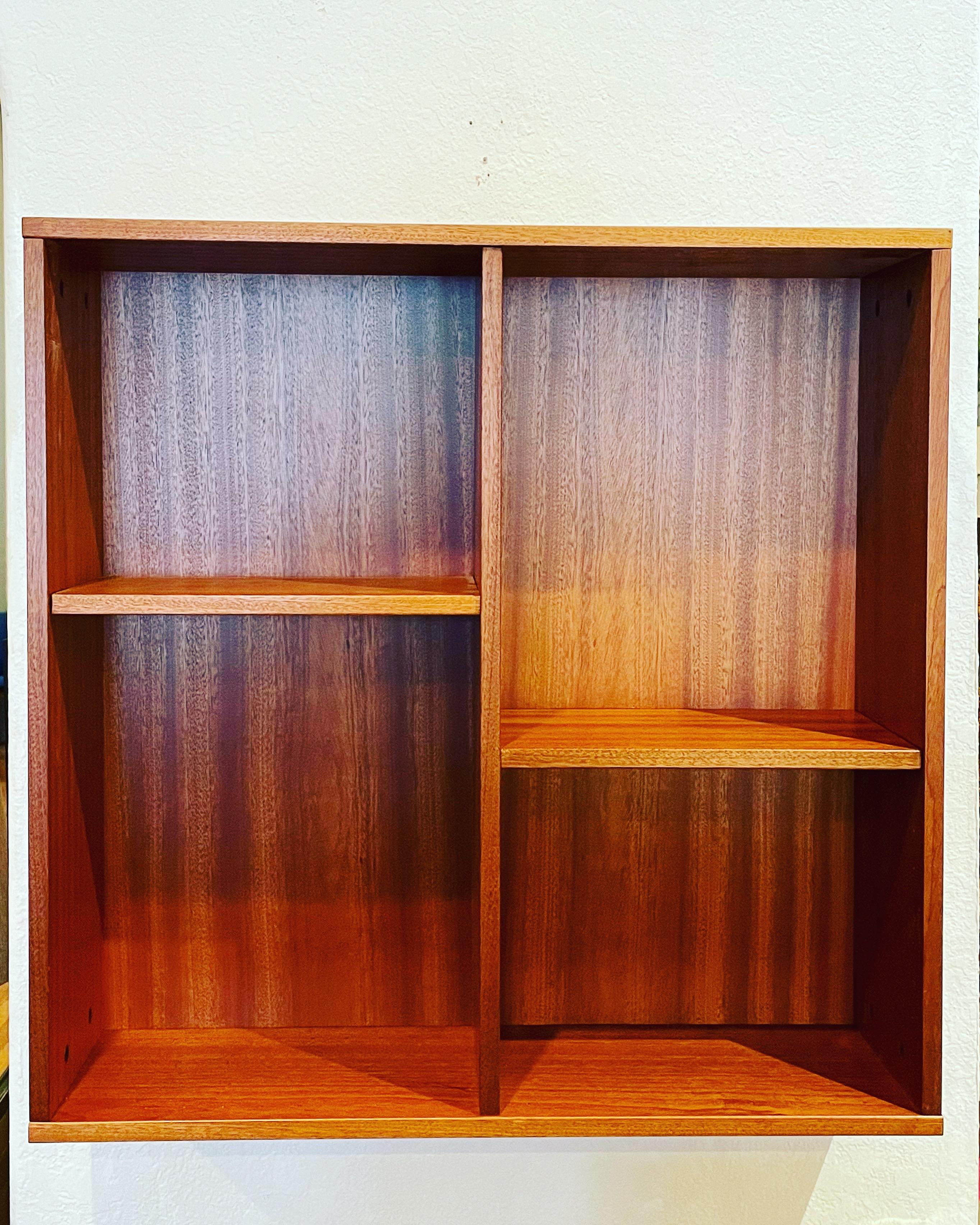 Versatile Danish modern wall hanging cabinet in teak with removable shelves each side its 14