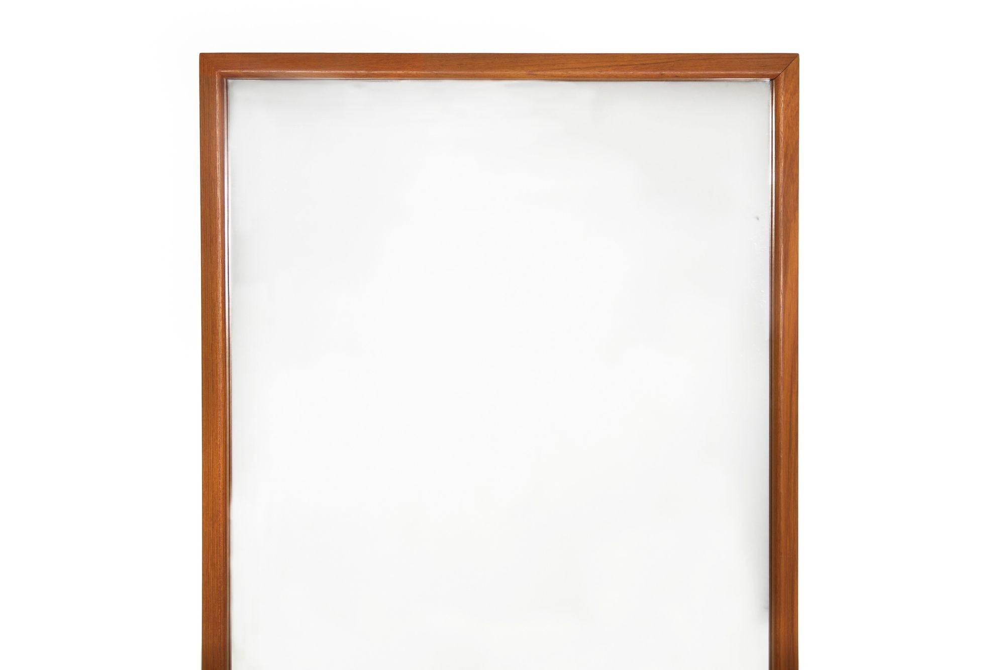 Danish Modern Teak Wall Mirror, Vildbjerg Møbelfabrik circa 1960s
Item # 001XVZ25L

A very sleek and austere molded teak wall mirror by Vildbjerg Møbelfabrik of Denmark. Exhibits tidy lines in the solid teak frame and remains in nearly pristine