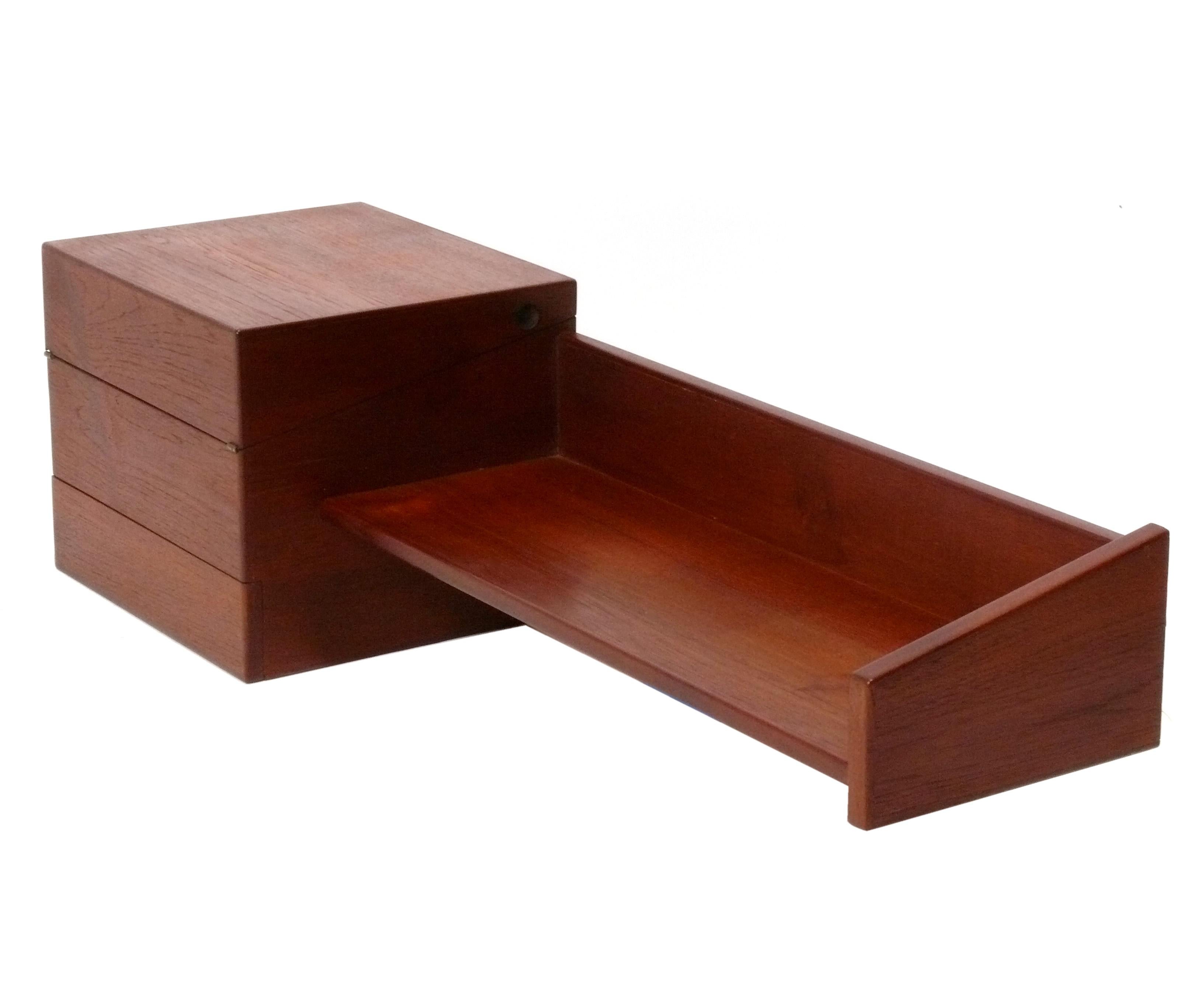 Danish Modern Teak Wall Mounted Floating Console Table and Arched Mirror, design attributed to Arne Hovmand-Olsen for Mogens Kold, Denmark, circa 1960s. Perfect place to store your keys, dog leash, and other items when you come in and out of the