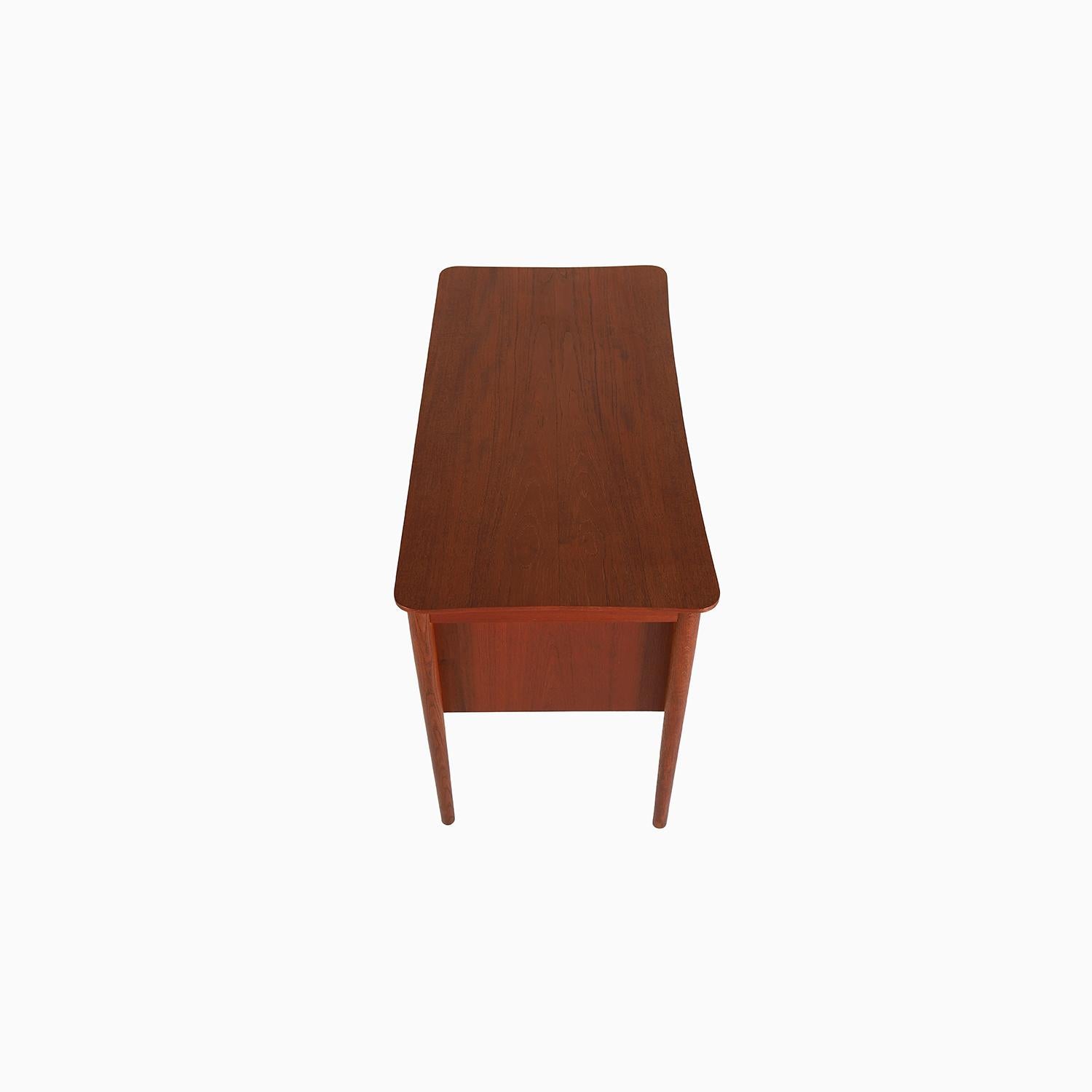 Scandinavian Modern danish modern teak writing desk with curvilinear top For Sale