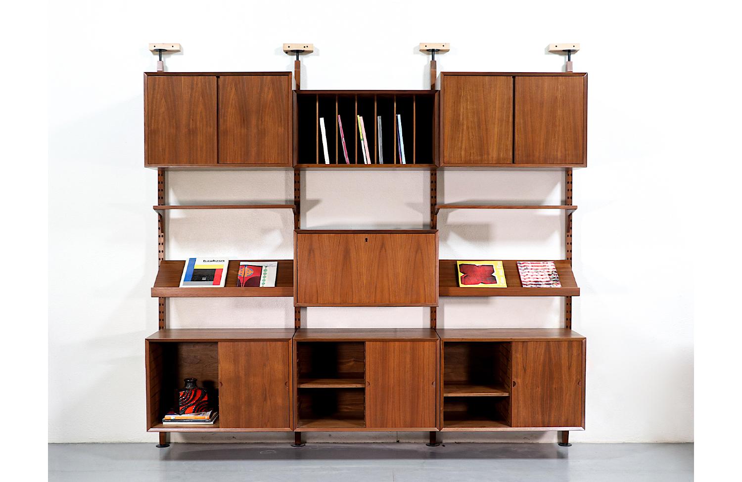 Danish Modern tension Pole wall unit system by Poul Cadovius.