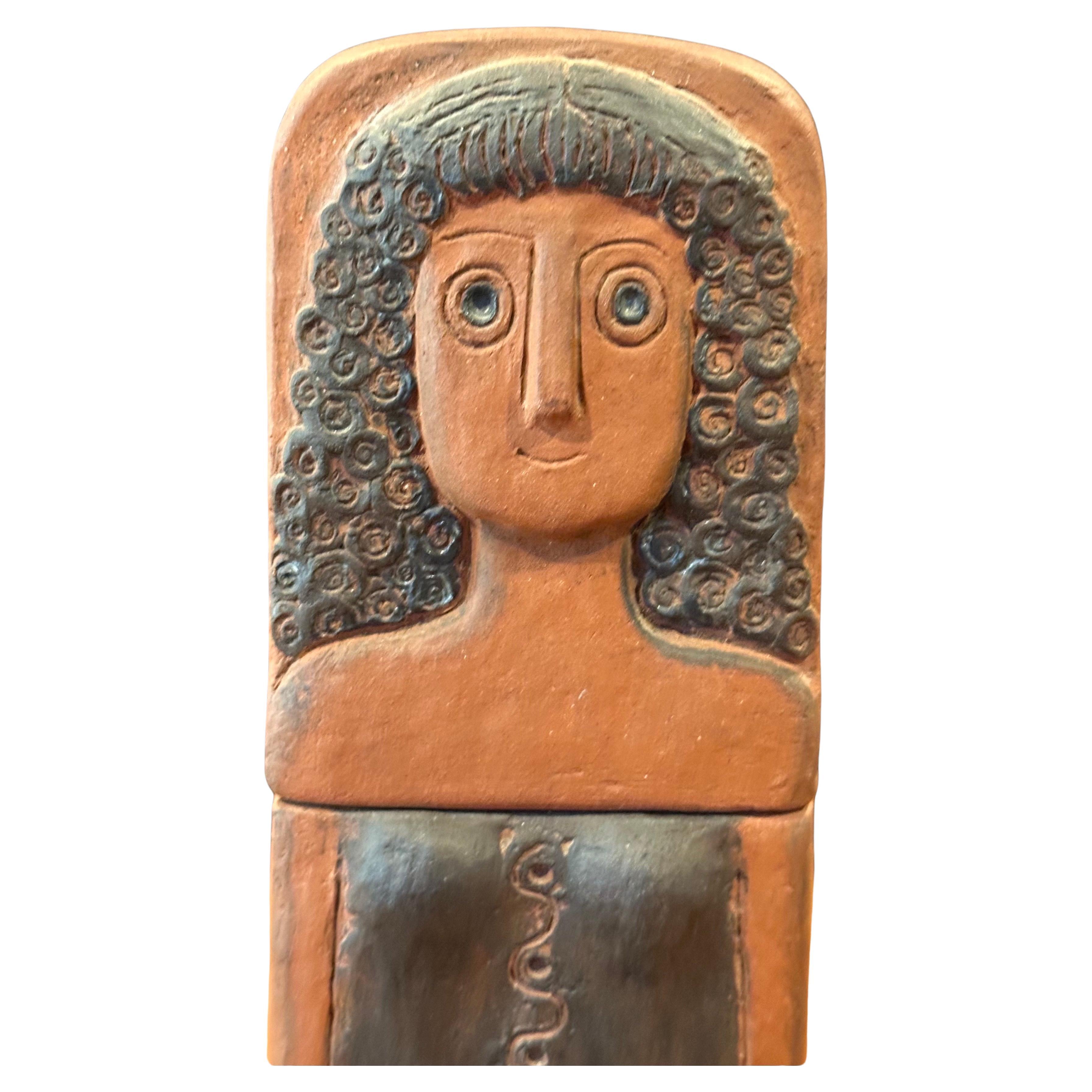 A rare and hard to find Danish modern terracotta candle holder by Thyssen Keramik, circa 1970s. The piece is in very good vintage condition with no chips or cracks and measures 4