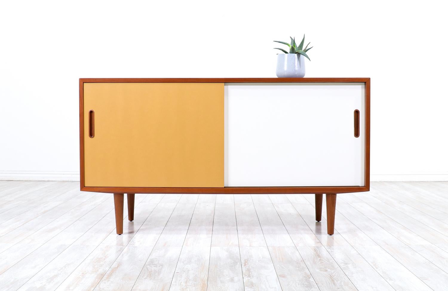 Danish Modern two-tone lacquered & teak credenza by Carlo Jensen for Hundevad.