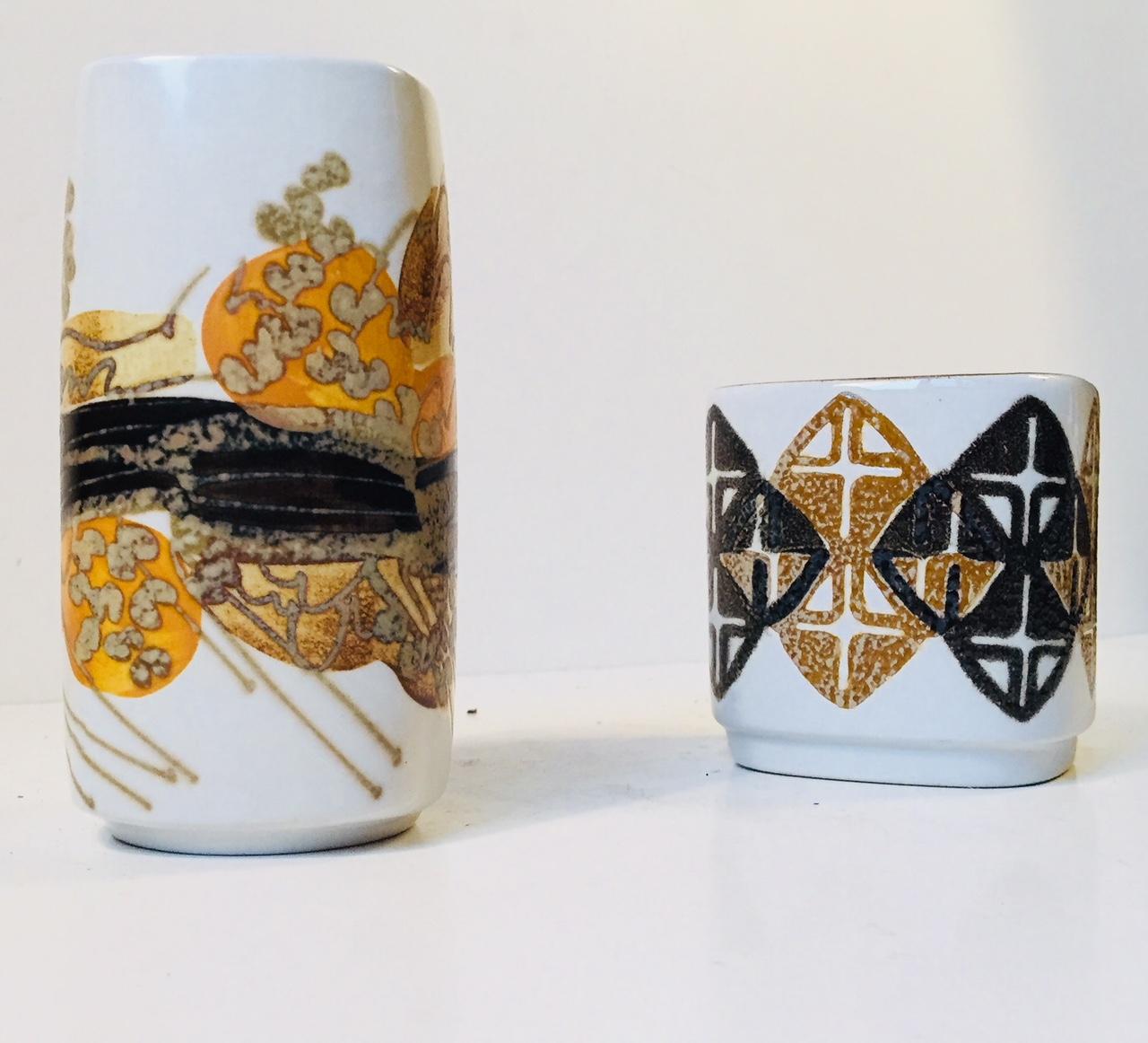 A set of faience vases with abstract - modernistic decor in contrasting glazes. Both designed by the Danish ceramist Ellen Malmer (EM) and manufactured by Royal Copenhagen during the 1970s. Both are fully signed, numbered and marked to the base. The