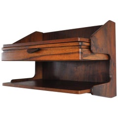 Danish Modern Wall Mounted Storage in Teak and Rosewood