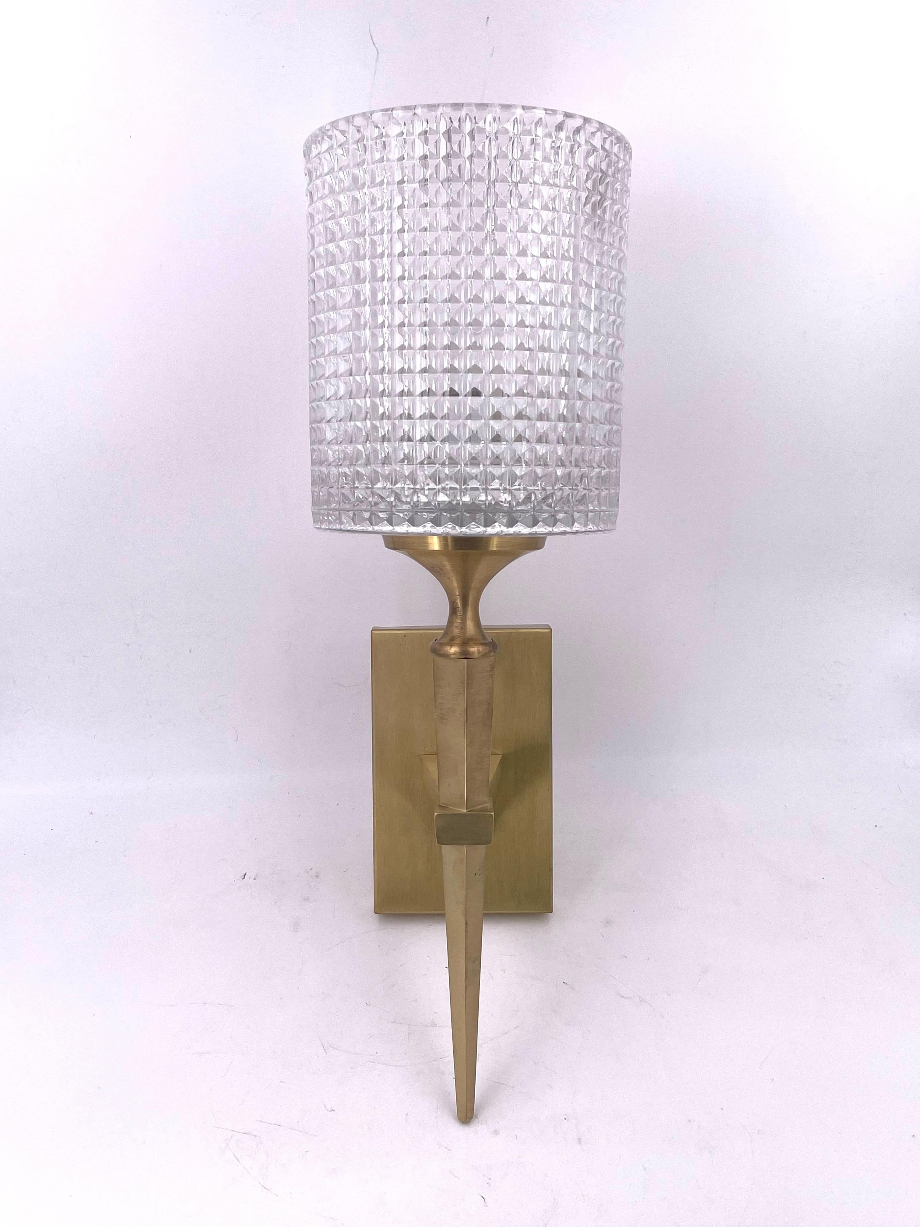 This stunning Carl Fagerlund for Orrefors sconce features a single thick glass shade and solid brushed brass polished 
base made in Sweden circa 1970's, Its in great condition never installed needs to be hard-wired, and takes up to 100 watts