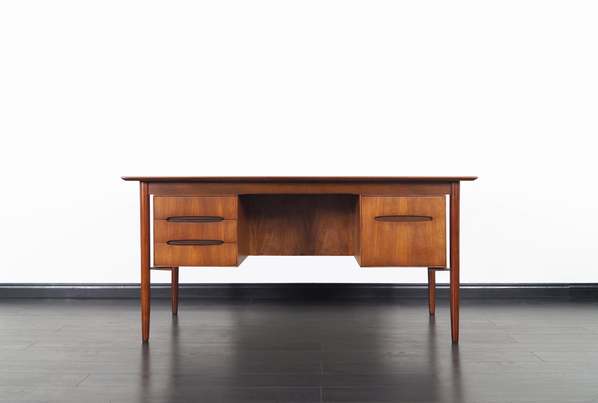 Danish Modern Walnut Desk by Ib Kofod Larsen In Excellent Condition In North Hollywood, CA