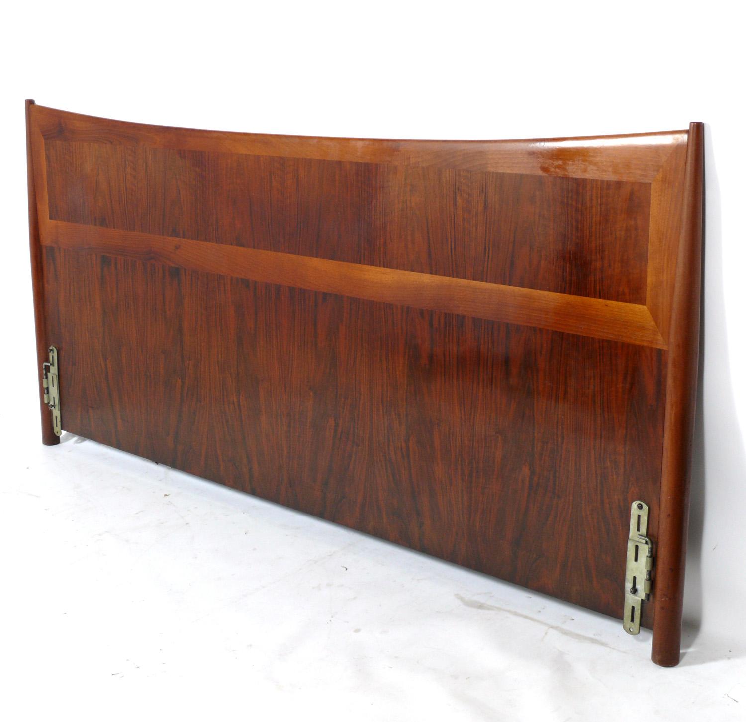 Danish modern walnut king size headboard, Denmark, circa 1960s. Beautiful graining to the wood. It has been cleaned and Danish oiled. Connects to most standard Hollywood frames.
