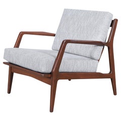 Silla de salón danesa moderna de nogal de Ib Kofod-Larsen