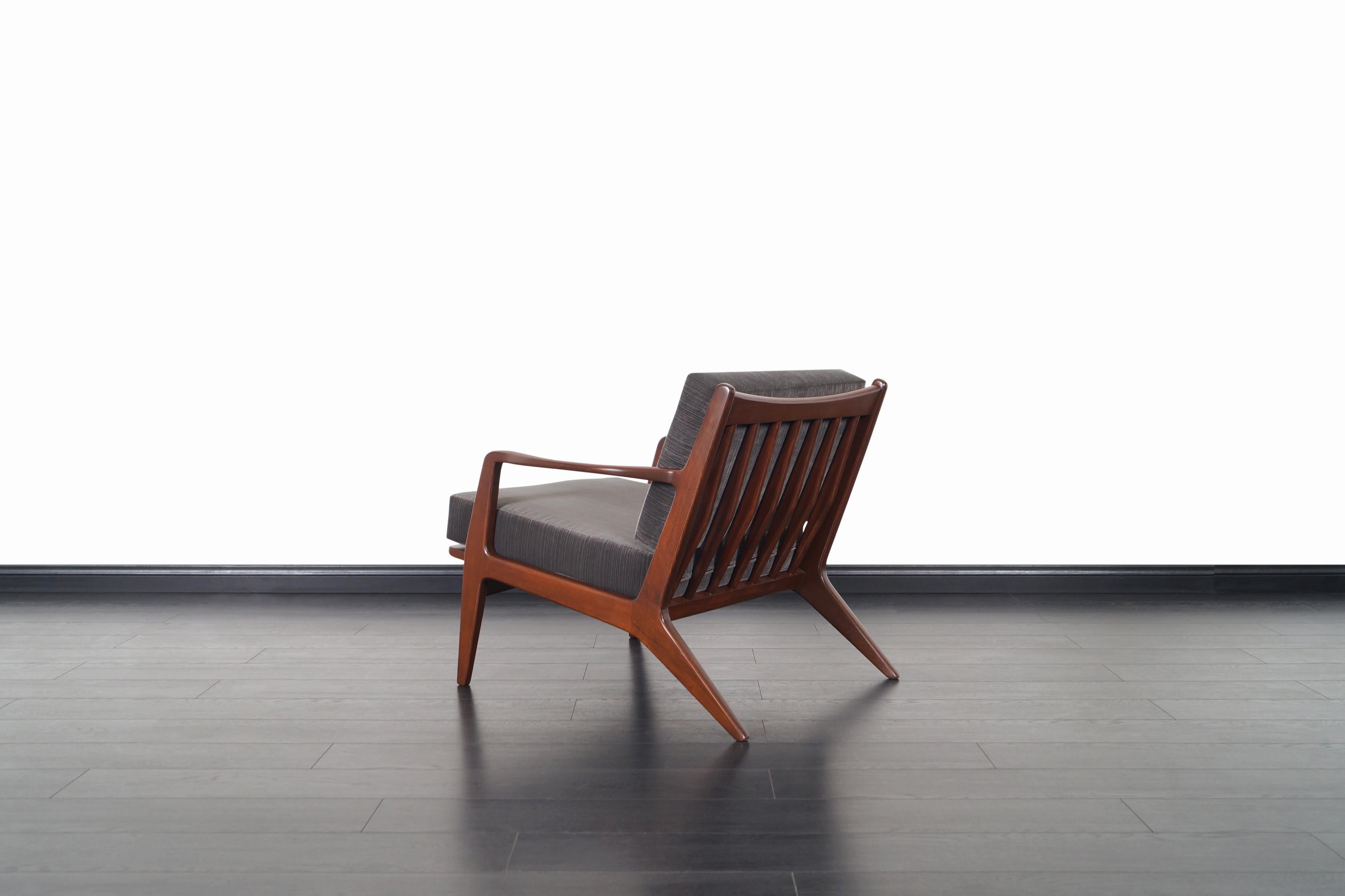 Danish Modern Walnut Lounge Chairs by Ib Kofod-Larsen 3