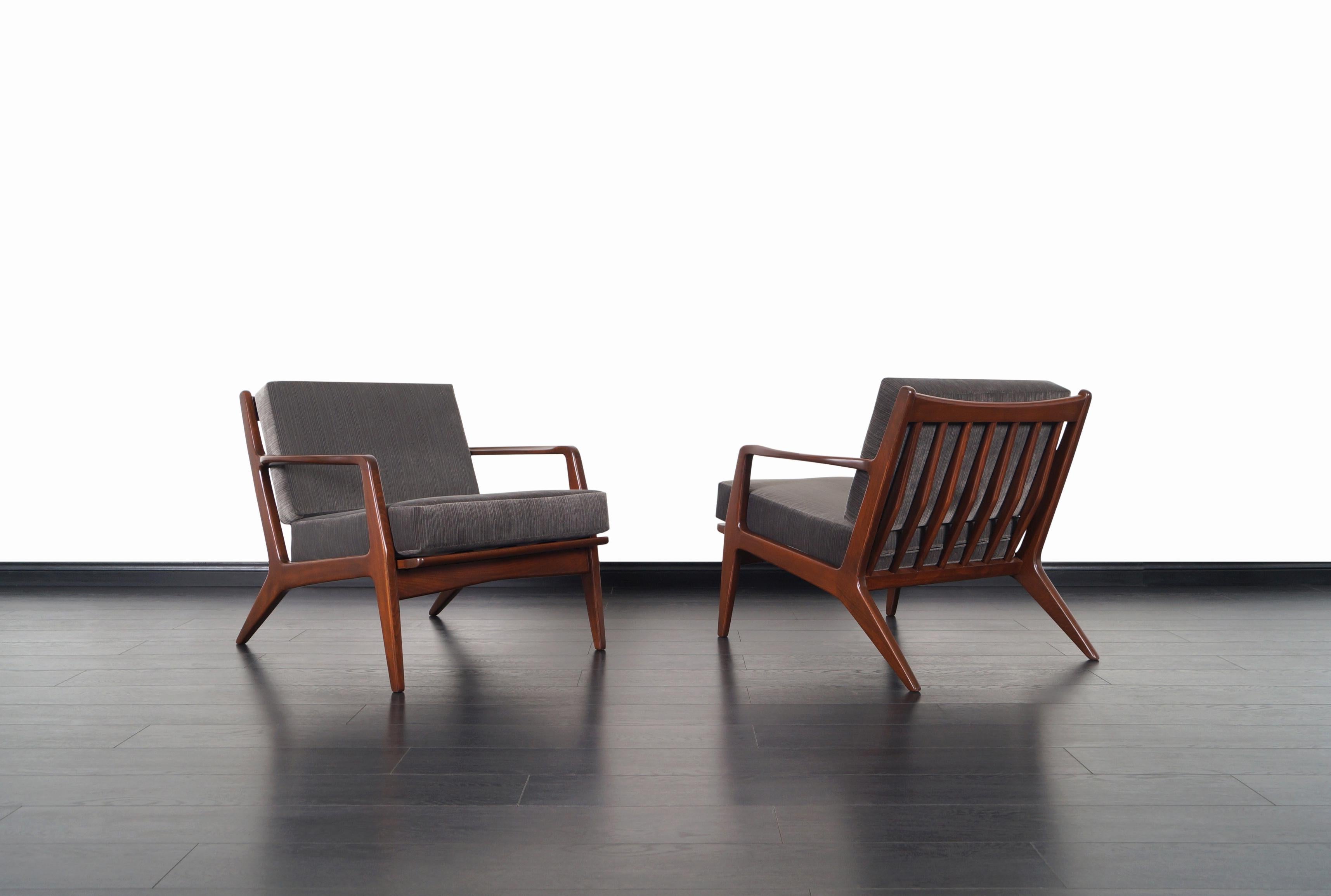 Mid-Century Modern Danish Modern Walnut Lounge Chairs by Ib Kofod-Larsen