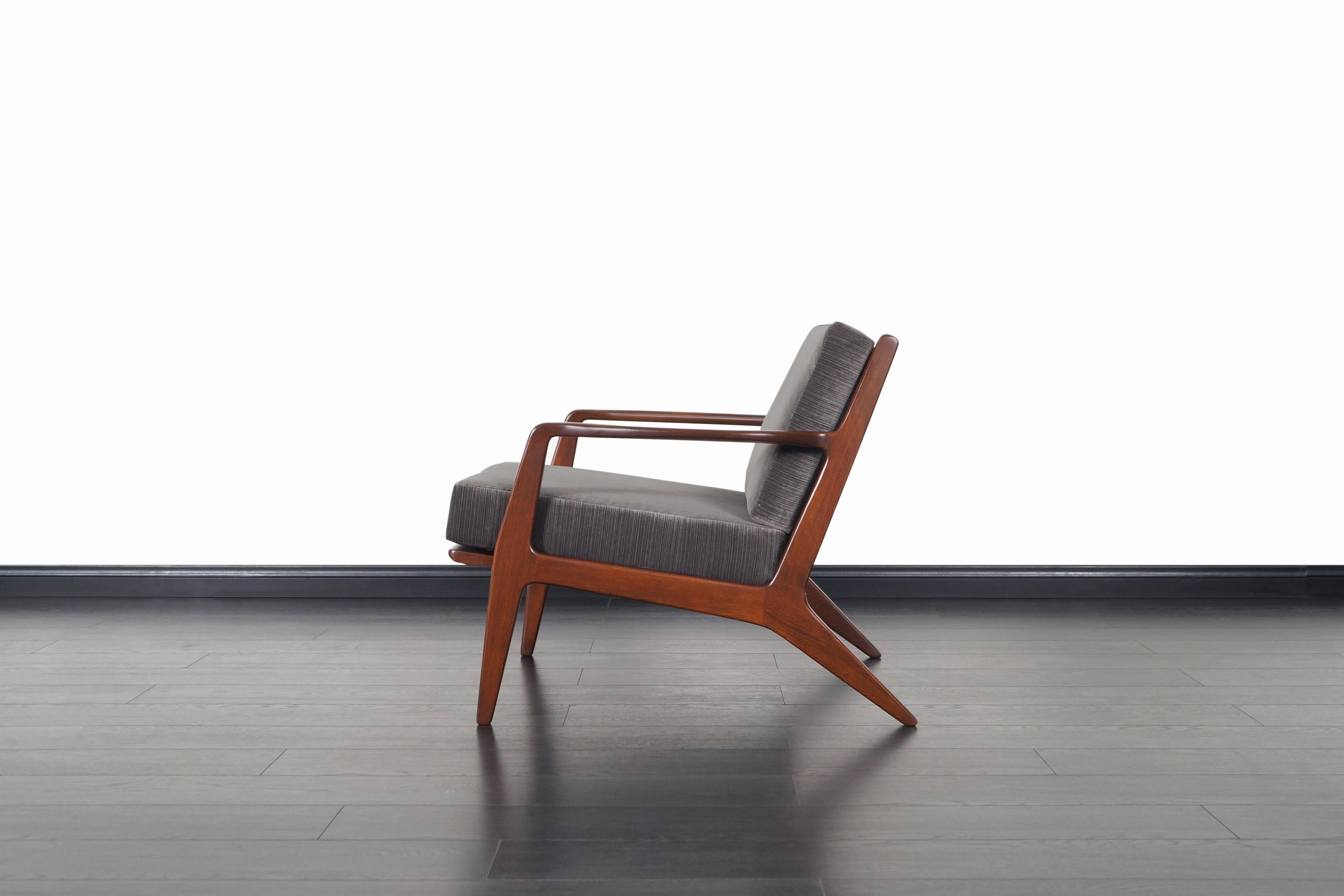 Danish Modern Walnut Lounge Chairs by Ib Kofod-Larsen 1