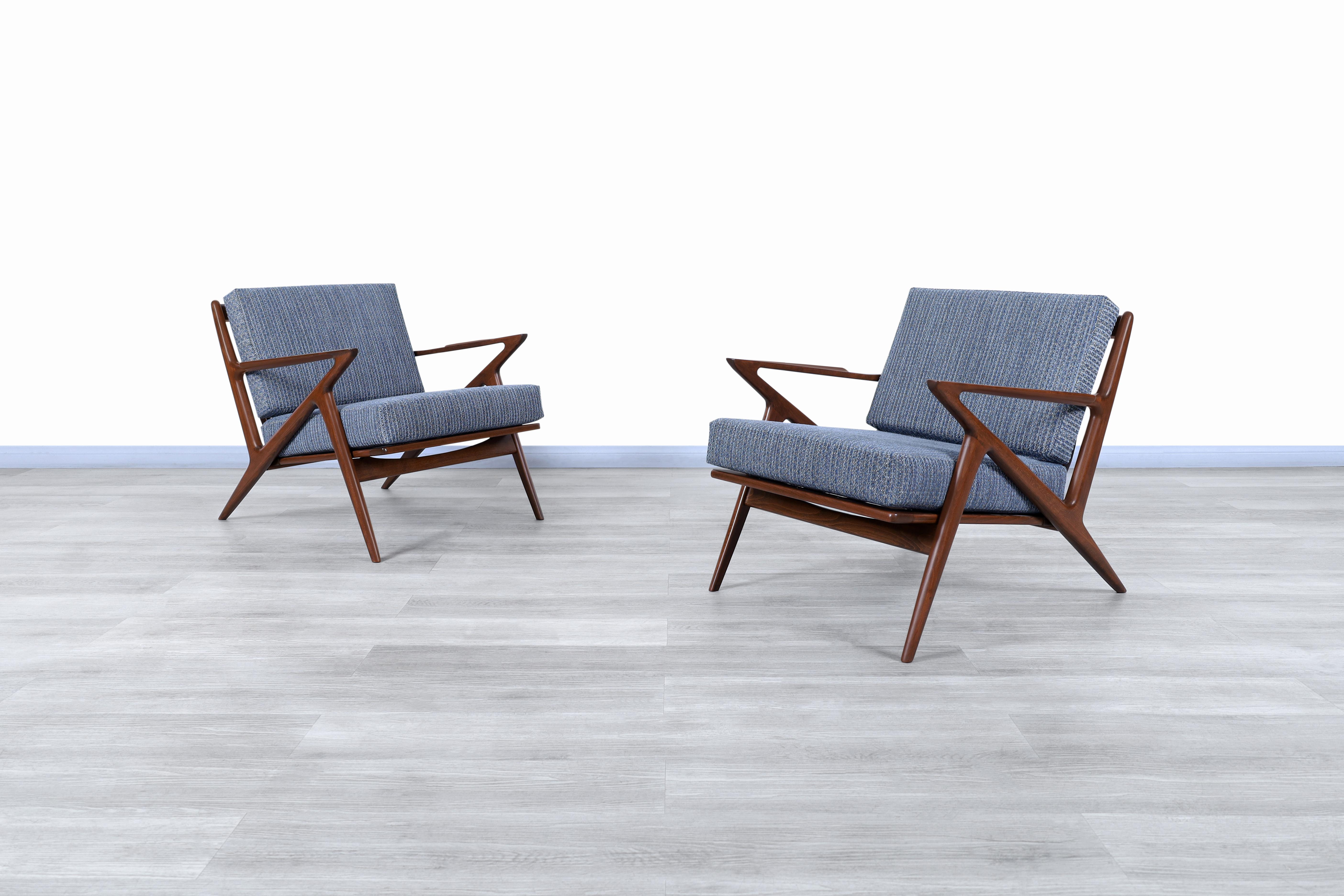 Amazing pair of Danish modern lounge chairs designed by Poul Jensen for Selig in Denmark, circa 1960s. Known as the “Z” chair for its exclusive armrests that connect to the legs and give the illusion of a letter Z. These chairs stand out for the
