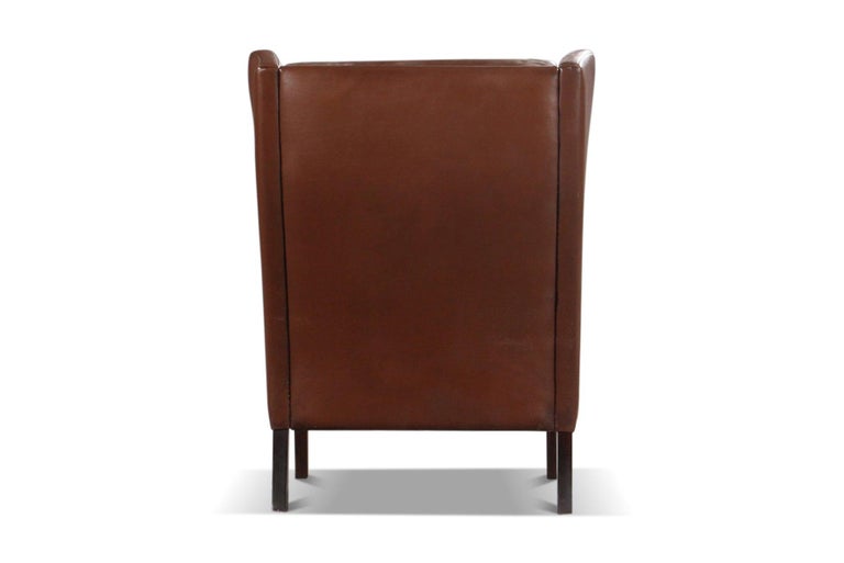 20th Century Danish Modern Wingback Lounge Chair in Brown Leather