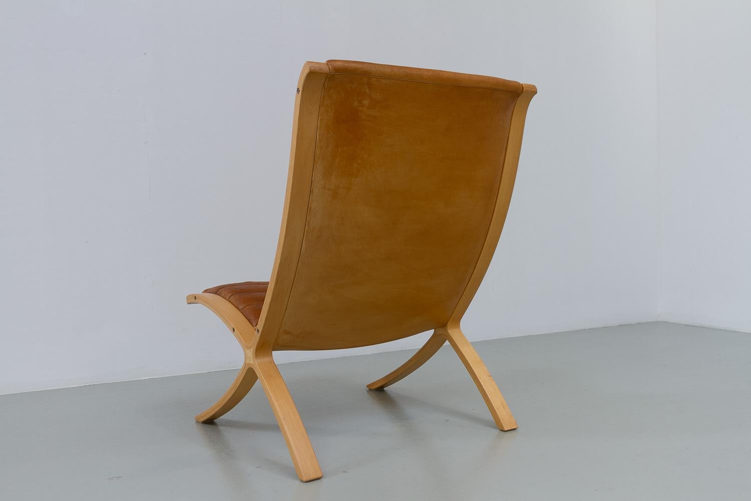 Silla X danesa moderna de Hvidt & Mølgaard para Fritz Hansen, década de 1970. Cuero en venta