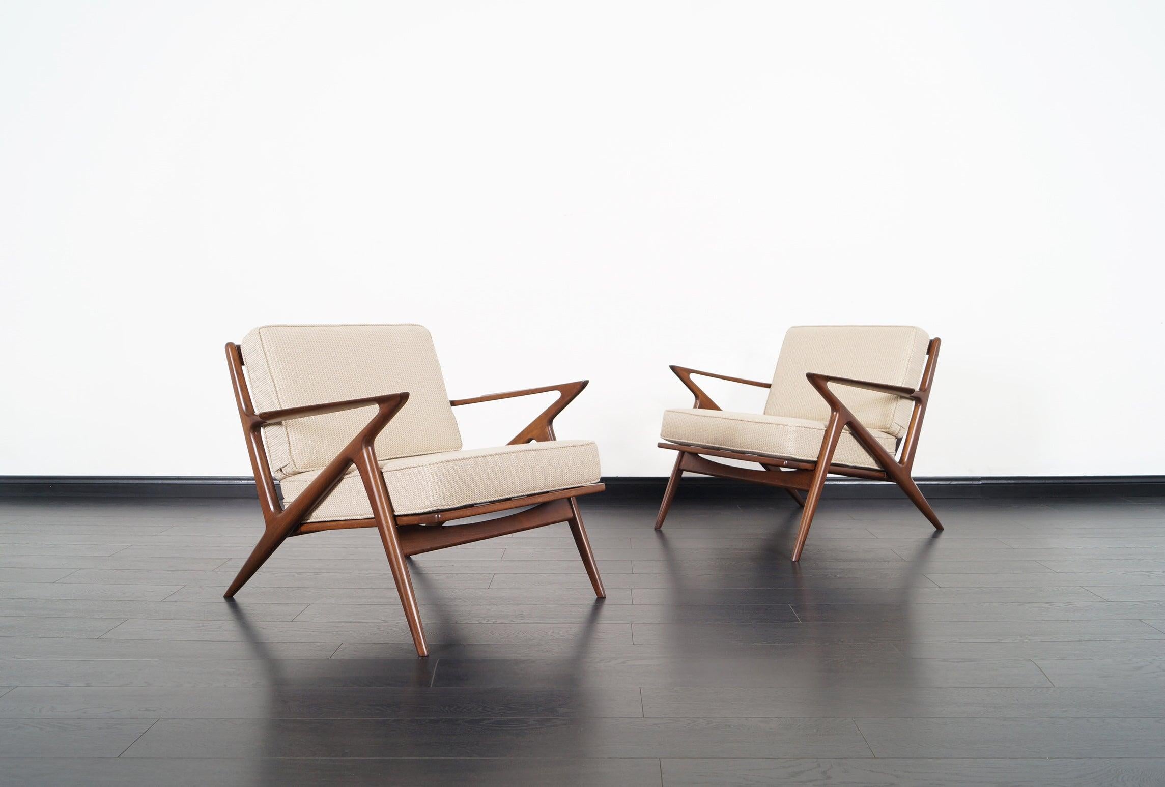 A stunning pair of Danish modern lounge chairs designed by Poul Jensen for Selig. Known as the 