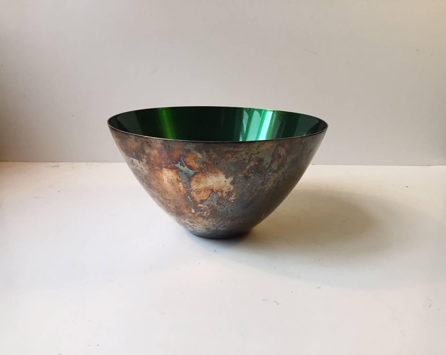 Patinated conical silver plate bowl decorated to the interior with a deep green enamel. Manufactured and designed in Denmark during the late 1950s by DGS (Danish Silver- & Goldsmith association). Stamped to the base. The silver plated exterior is
