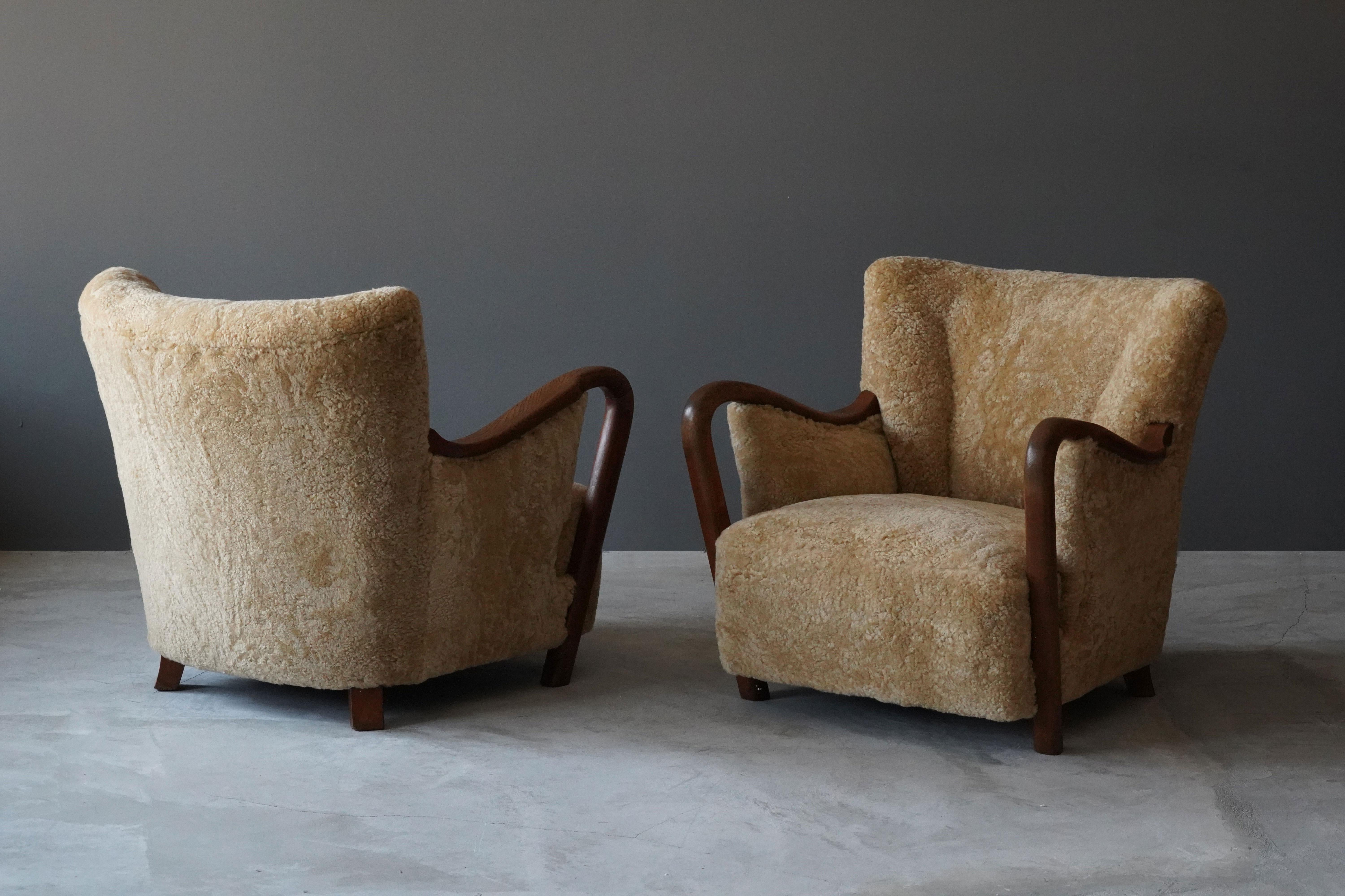 Danish Modernist Designer, Lounge Chairs, Sheepskin, Stained Beech Denmark 1940s In Good Condition In High Point, NC