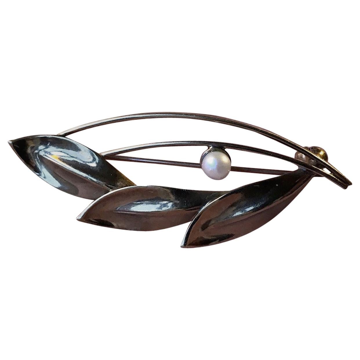 Danish Modernist Leaf Brooch in Gold and with Akoya Pearl by Herman Siersbøl