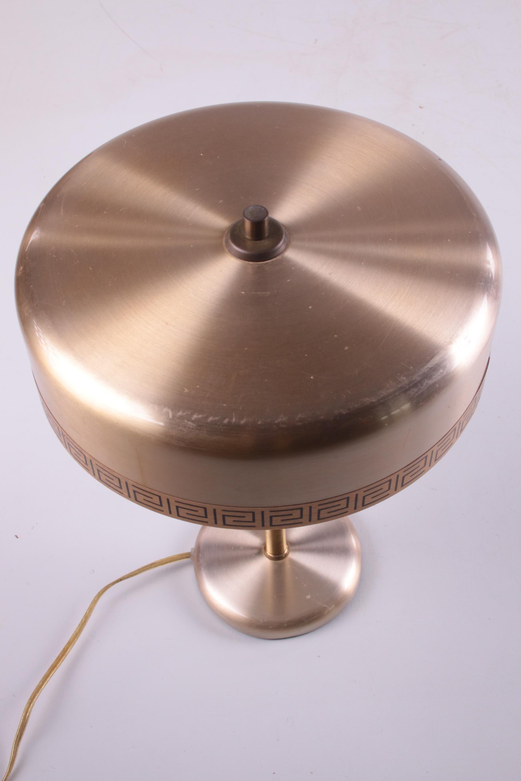 Desk lamp designed and manufactured by 
Vitrika in Denmark in the 60s - 
Model number 40304 
called 'Chief' - 

With brass details and a hidden switch.