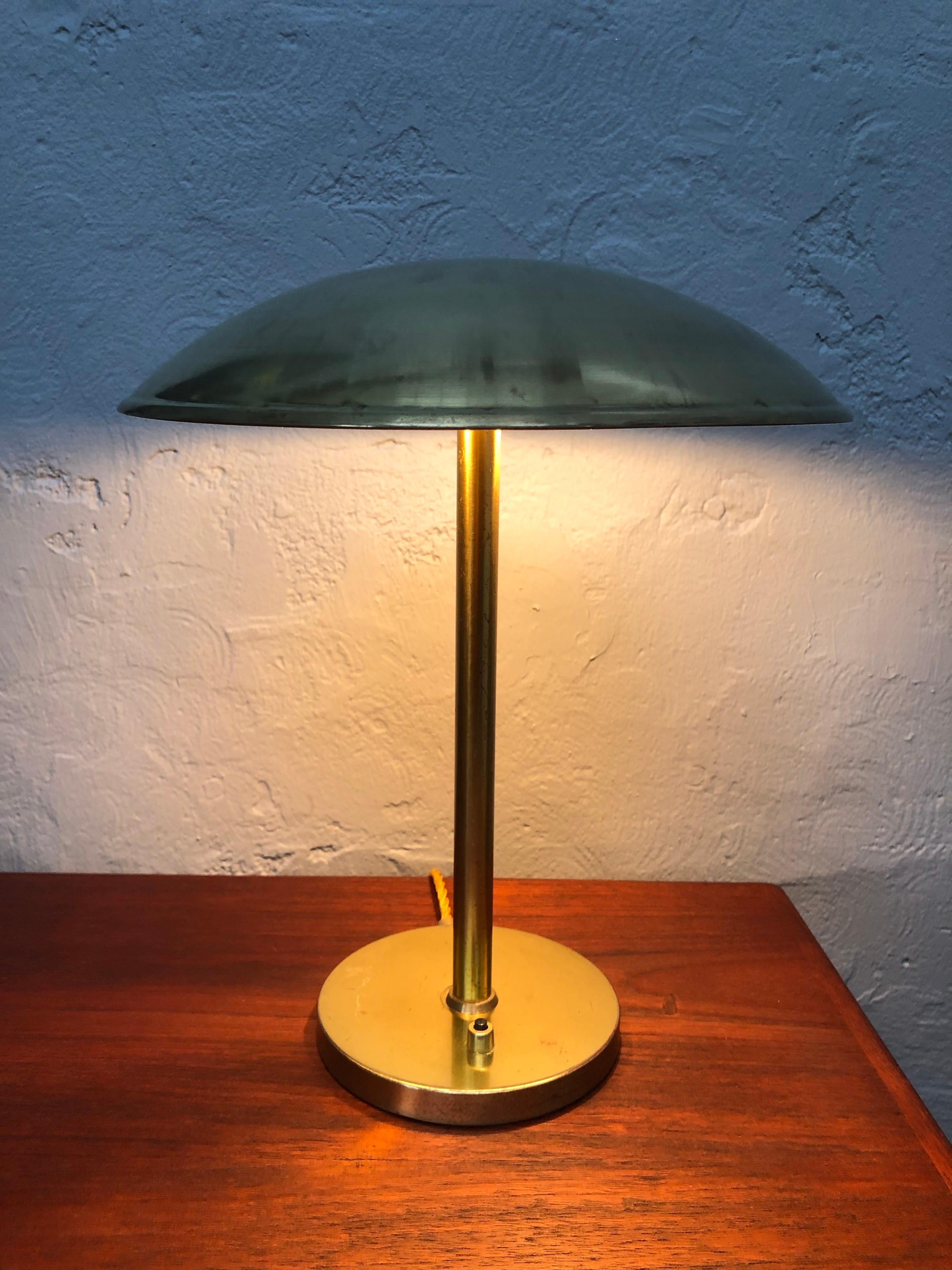 A Danish modernist table lamp in brass by Lyfa of Denmark. 
The designer is unknown but could be Bent Karlby as he started designing for Lyfa in the 1940s.
The provenance is Eastern Court House Bernstorffs Palace Copenhagen.
It is very likely that