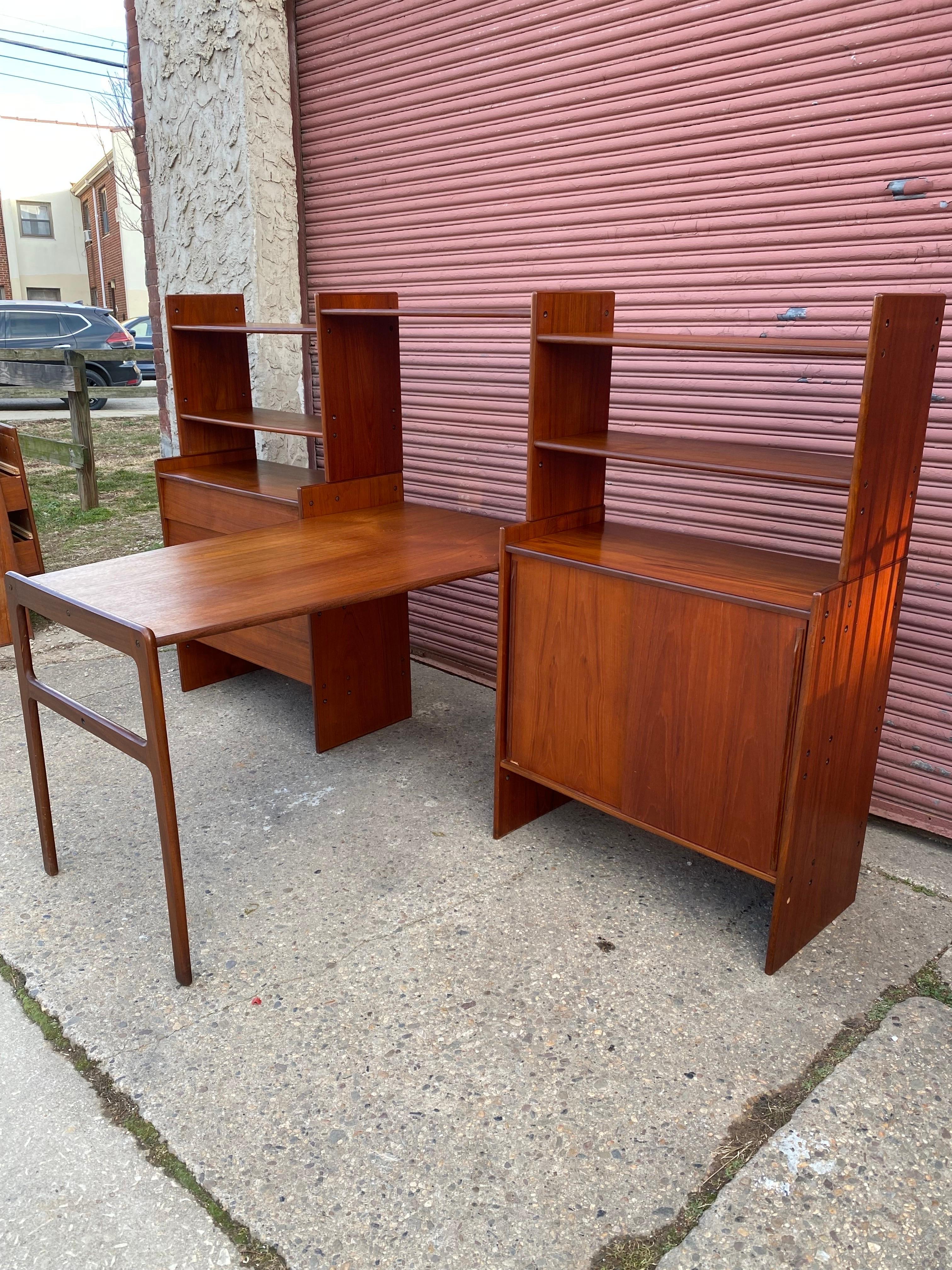 Danish Modern Modular Desk and Shelf System. Can be used in multiple ways, with or without the Desk Surface! All the main pieces come apart for easy transporting and carrying into tight spaces. Teak is all original with a couple minor flaws as seen