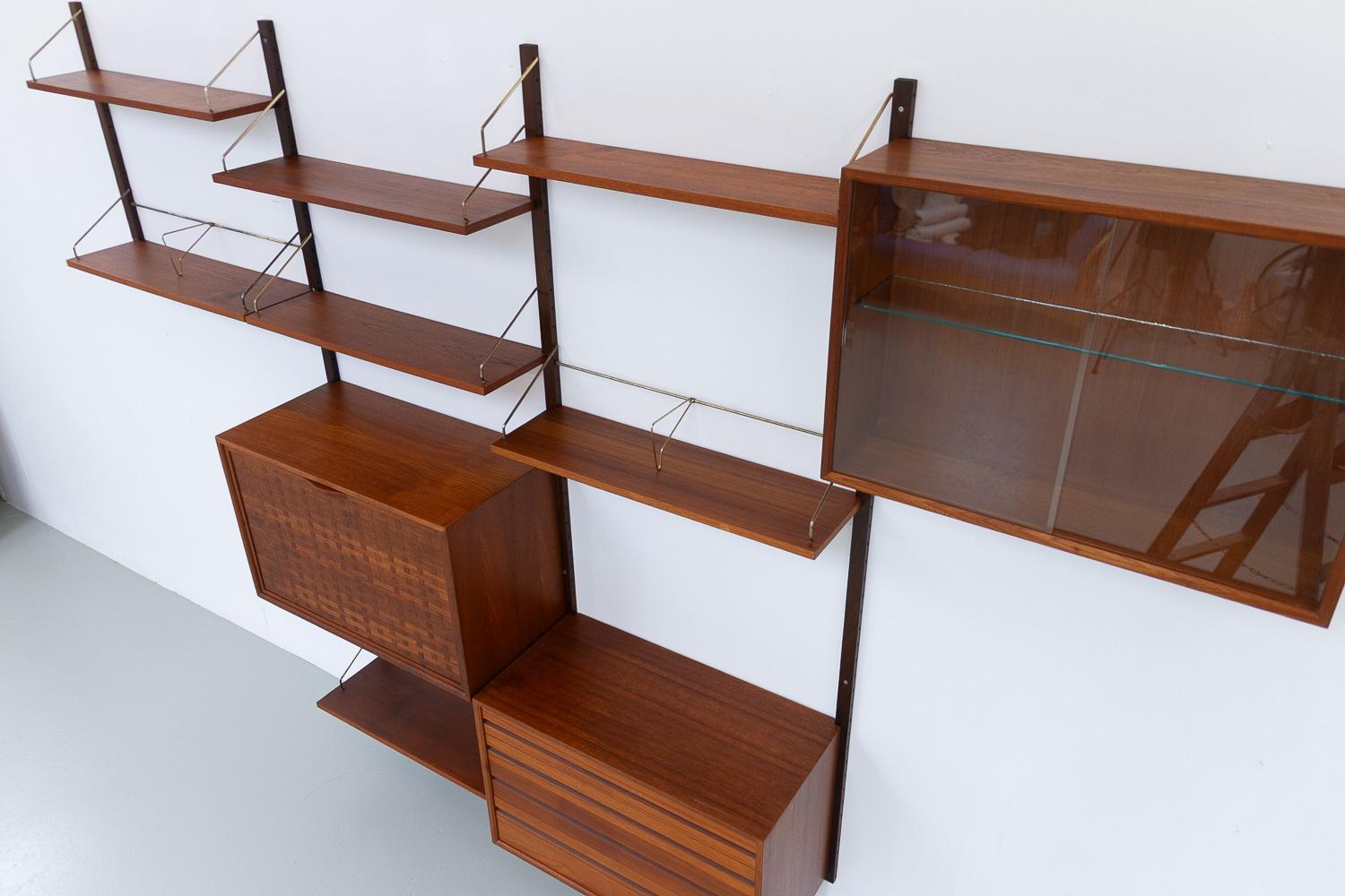Teak Parete attrezzata modulare danese in teak Royal di Poul Cadovius per Cado, 1950. in vendita