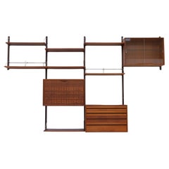 Modularer dänischer Wandschrank aus königlichem Teakholz von Poul Cadovius für Cado, 1950er Jahre.