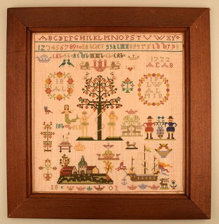 Danish name cloth embroidery. Dated 1803.
In very good condition.
Name cloth placed on board.
Measures: 40 cm x 38 cm. The frame measures: 7.5 cm.