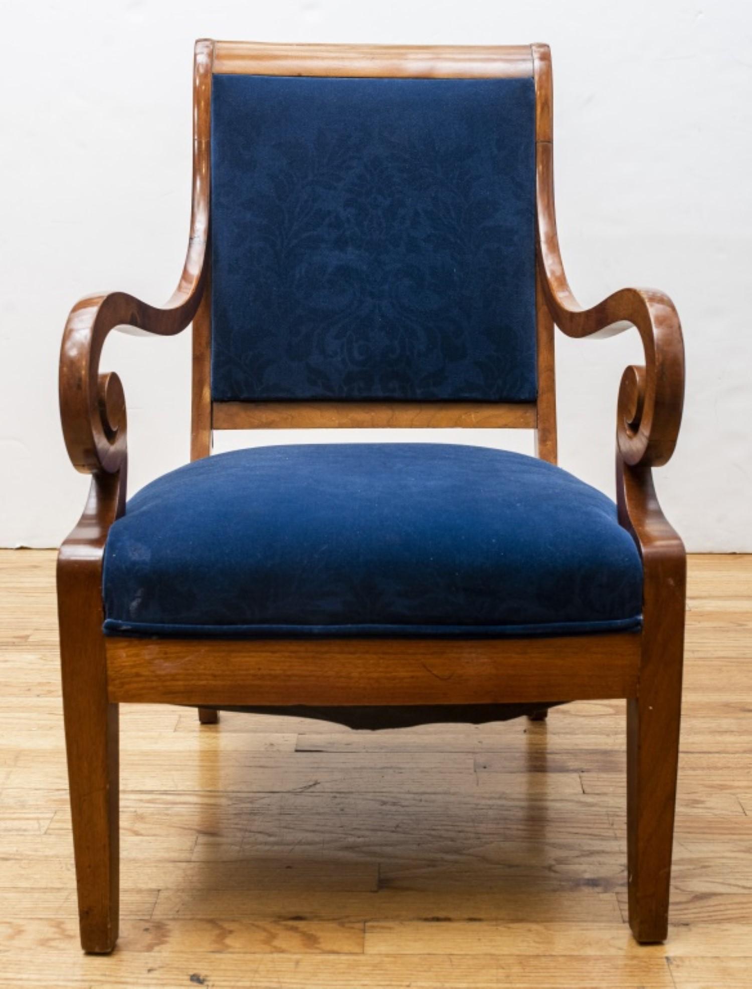 Danish Neoclassical Empire carved wood armchairs.

Featuring graceful scrolled armrests and luxuriously upholstered backs and seats.
Crafted from Danish wood in the Neoclassical Empire style.

Dealer: S138XX