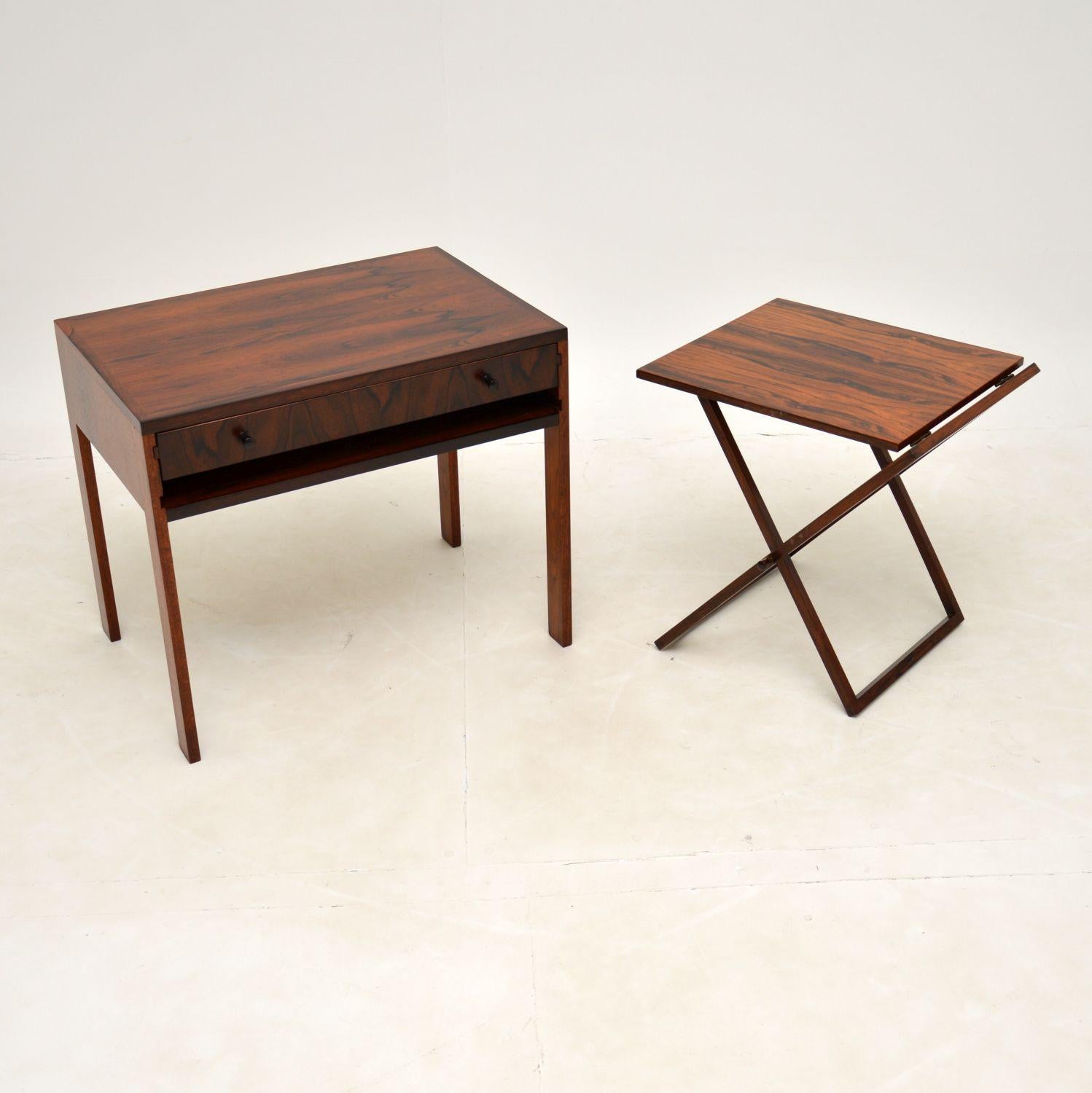 A stunning and rare design, these nesting tables were designed by Illum Wikkelso. They were made by CFC Silkeborg, and they date from the 1960’s.

They are of absolutely amazing quality and design, this particular set has an unusual twist. It is