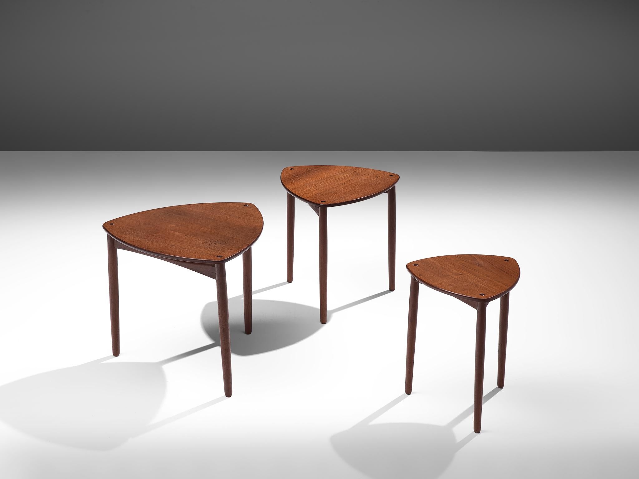 Ejner Larsen and Aksel Bender Madsen for Willy Beck, set of three nesting tables, teak, Denmark, 1950s.

Elegant set of three nesting tables by the Danish designer duo Ejner Larsen and Aksel Bender Madsen. Each tables has a triangular shaped top