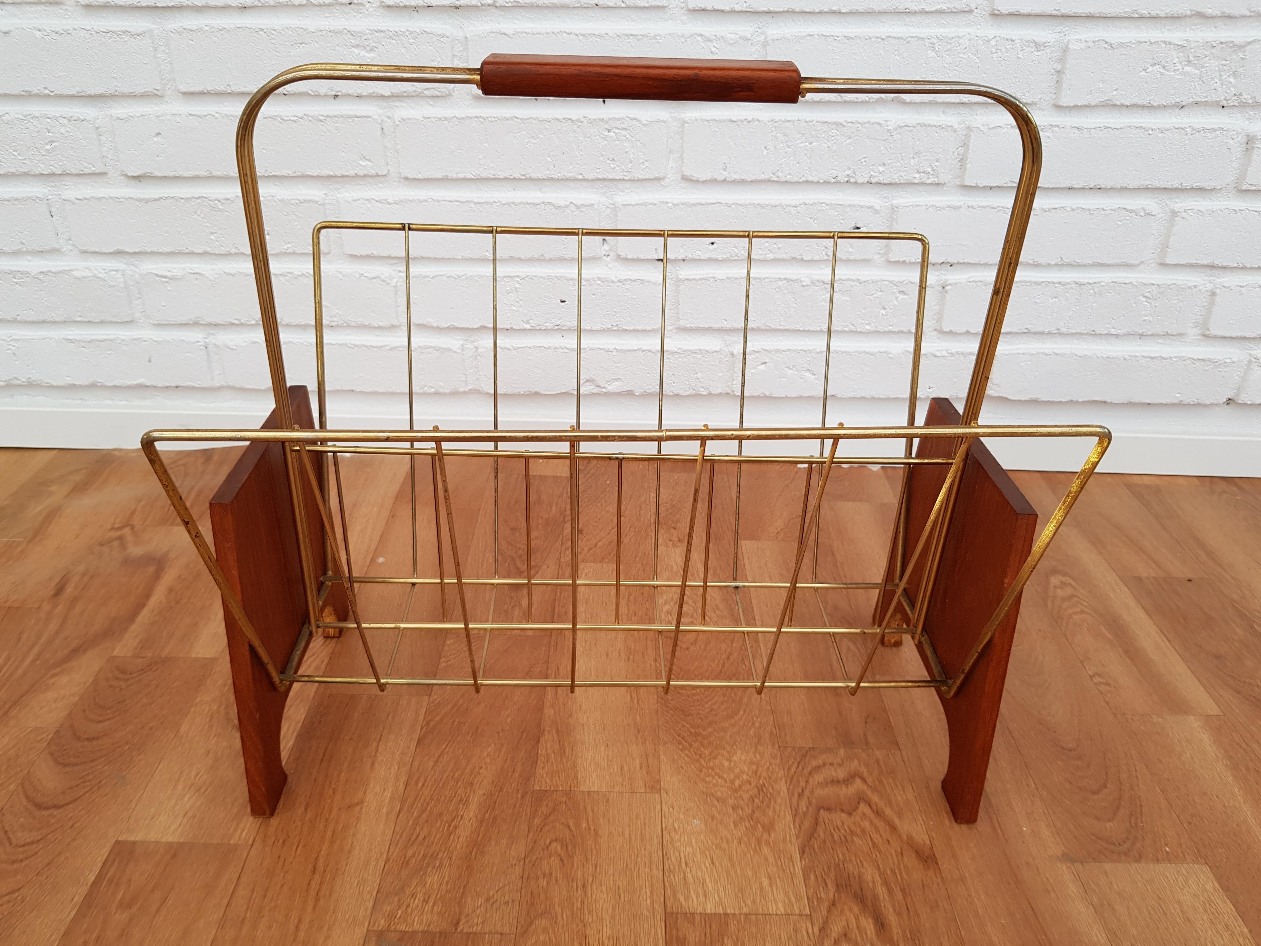 Danish design. Newspaper holder, teak wood, brass. Produced in about 1960 by Danish furniture manufacturer.
  