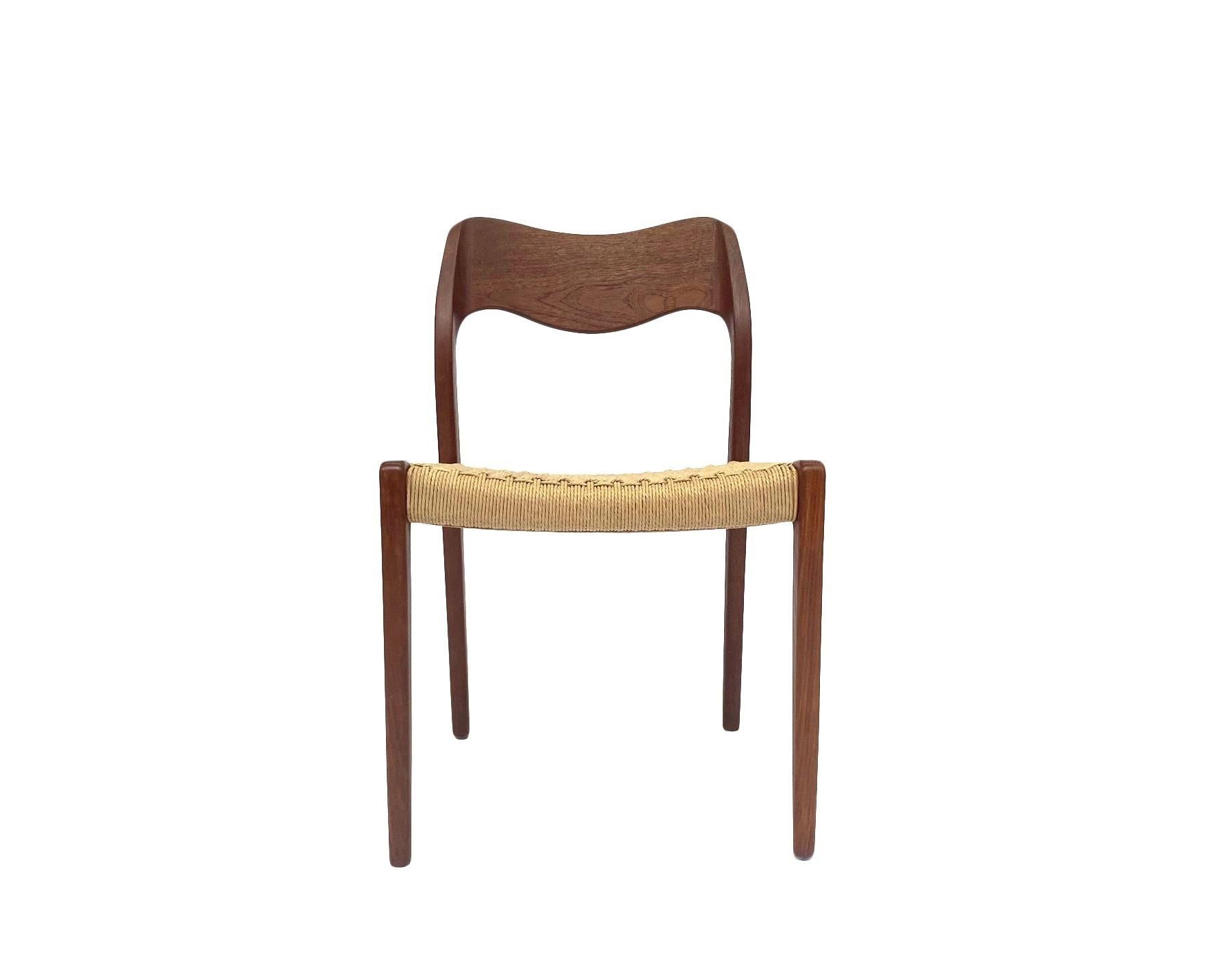An iconic Model 71 teak and paper cord chair designed by Niels O. Møller for J.L Møllers in the 1950s, this would make a stylish addition to any dining or work area.

The chair has a wide hand woven paper cord seat pad and a sculptured ergonomic