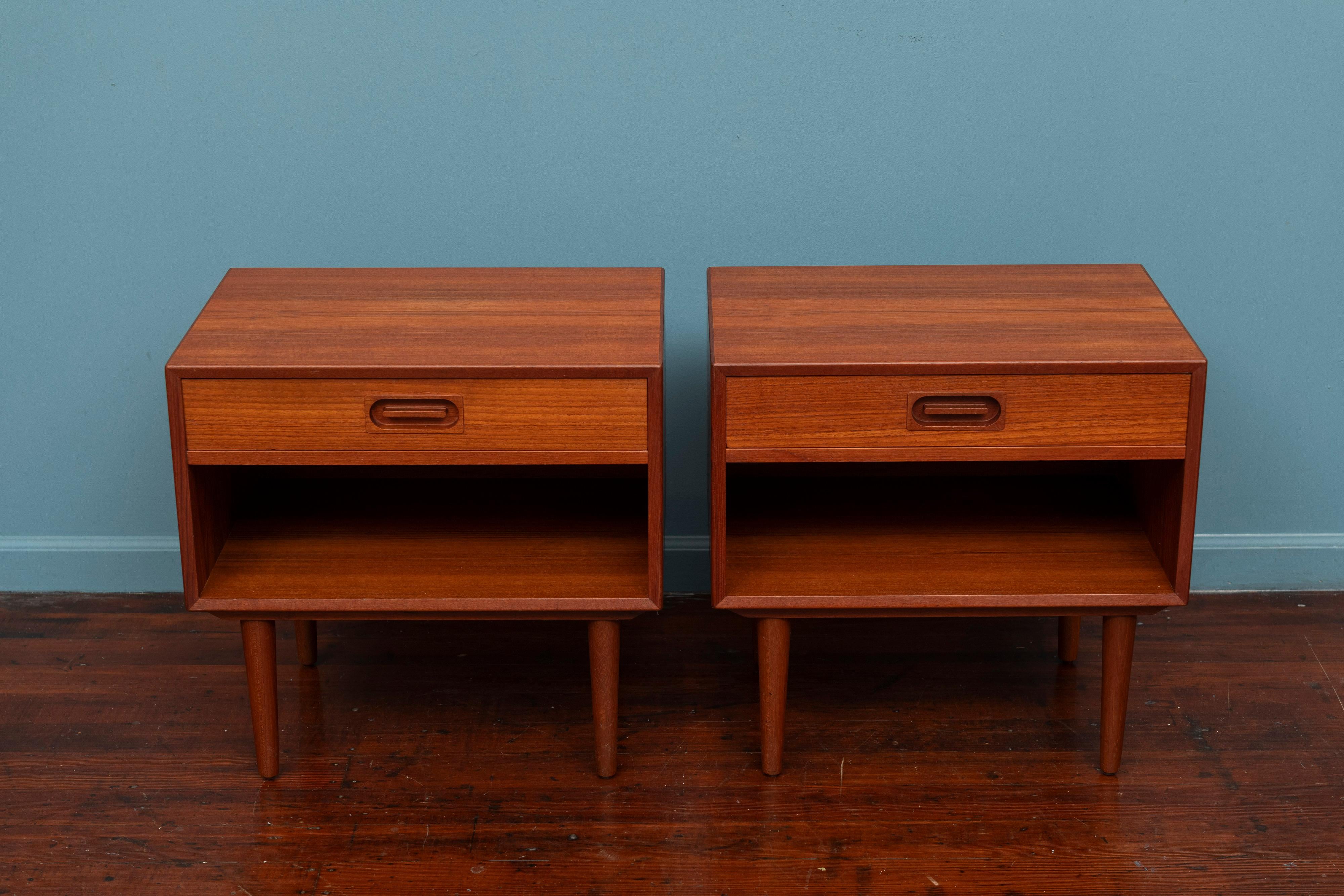 Pair of Johannes Andersen design nightstands for Drylund, Denmark. High quality materials and construction techniques combined with simple but elegant Danish design. Newly refinished and ready to install.