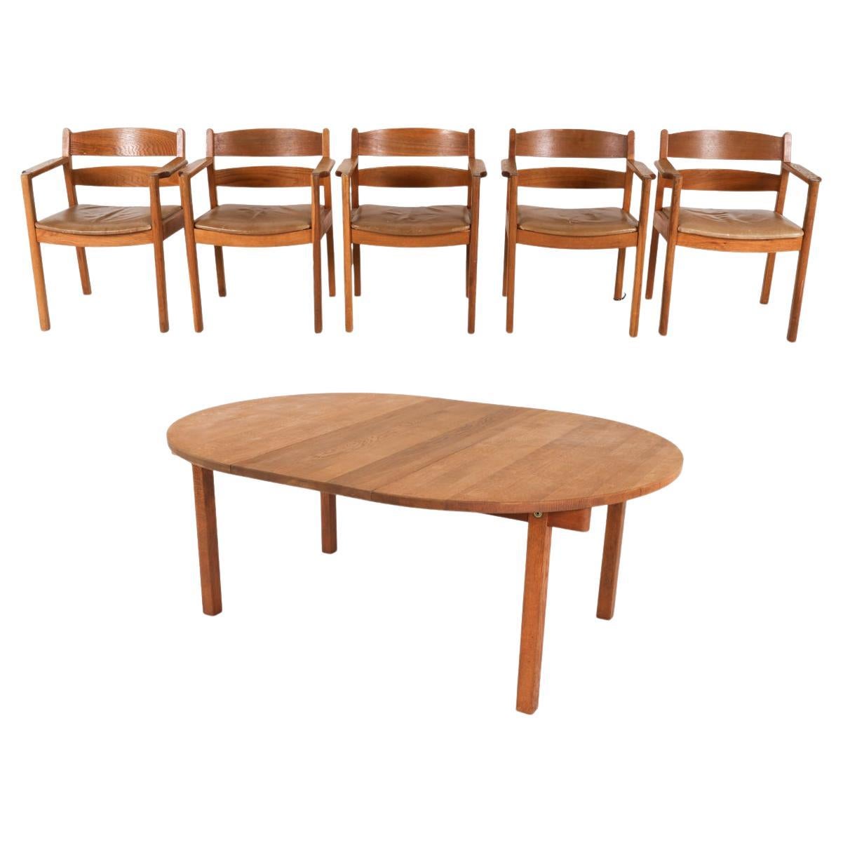 Dänischer Esstisch und Stühle aus Eiche und Leder von Kurt Ostervig, ca. 1960er Jahre im Angebot