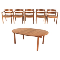 Dänischer Esstisch und Stühle aus Eiche und Leder von Kurt Ostervig, ca. 1960er Jahre